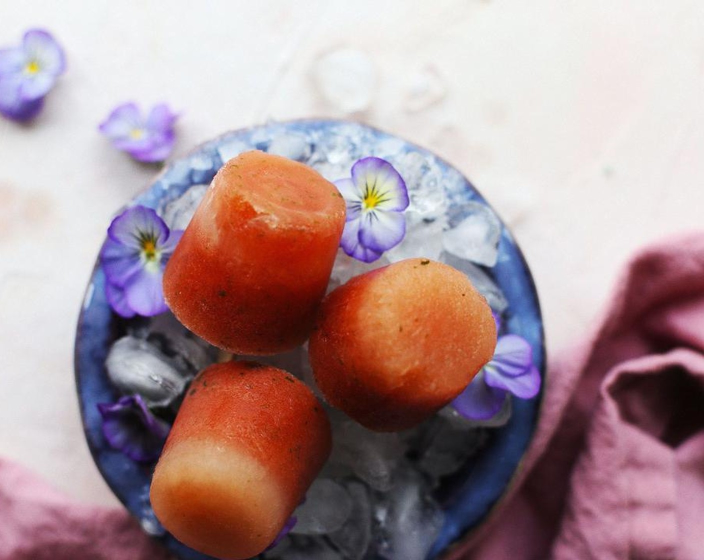 step 4 Place in the freezer for about two hours or until frozen. When ready to eat, dip each Dixie cup into warm water for a few seconds before tearing off of the cup to reveal the popsicle.