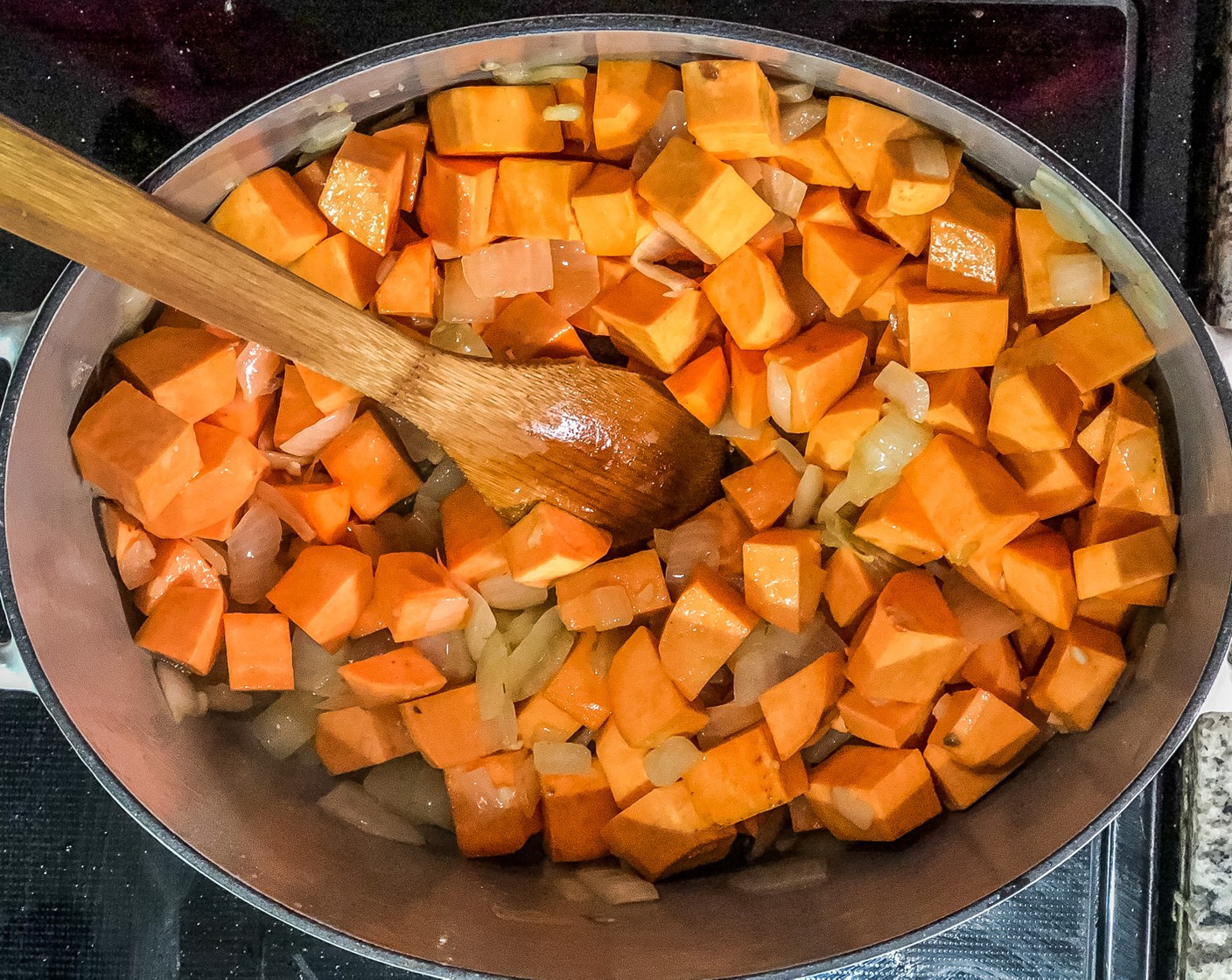 step 2 Add the Garlic (3 cloves) and cook for 10 seconds. Stir in Sweet Potatoes (4) and cook for 3 minutes.