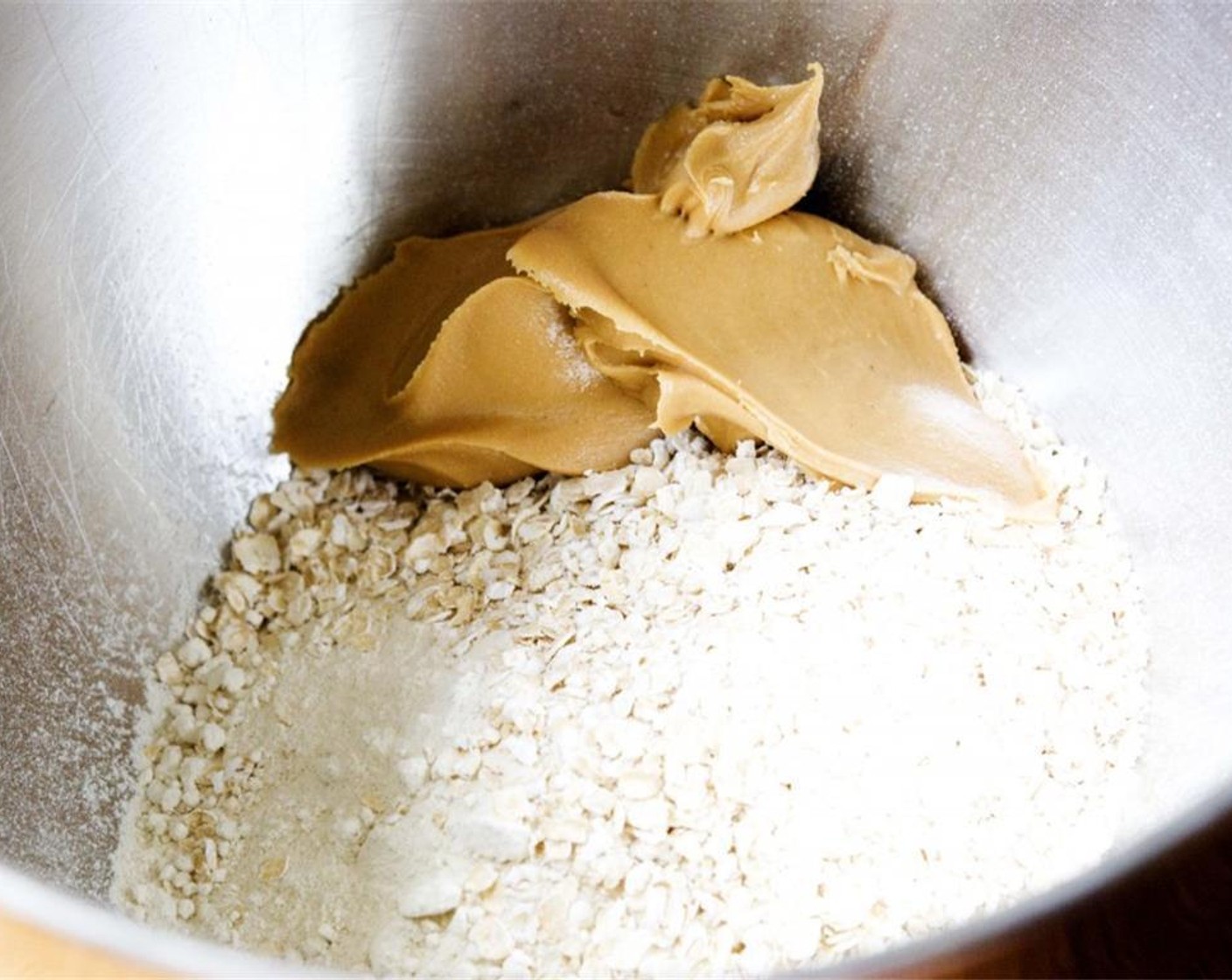 step 1 In a bowl, combine Oat Flour (1 cup), Old Fashioned Rolled Oats (1/2 cup), and Peanut Butter (4 Tbsp).