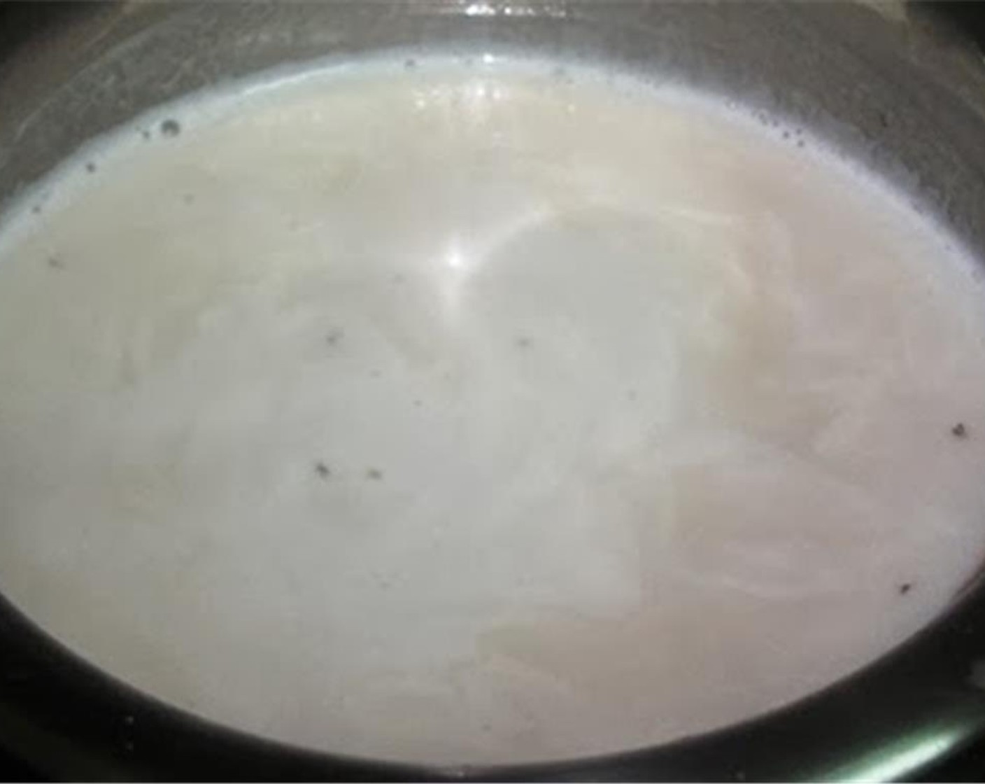 step 2 Bring the remaining milk and Brown Sugar (1/4 cup) to a boil.