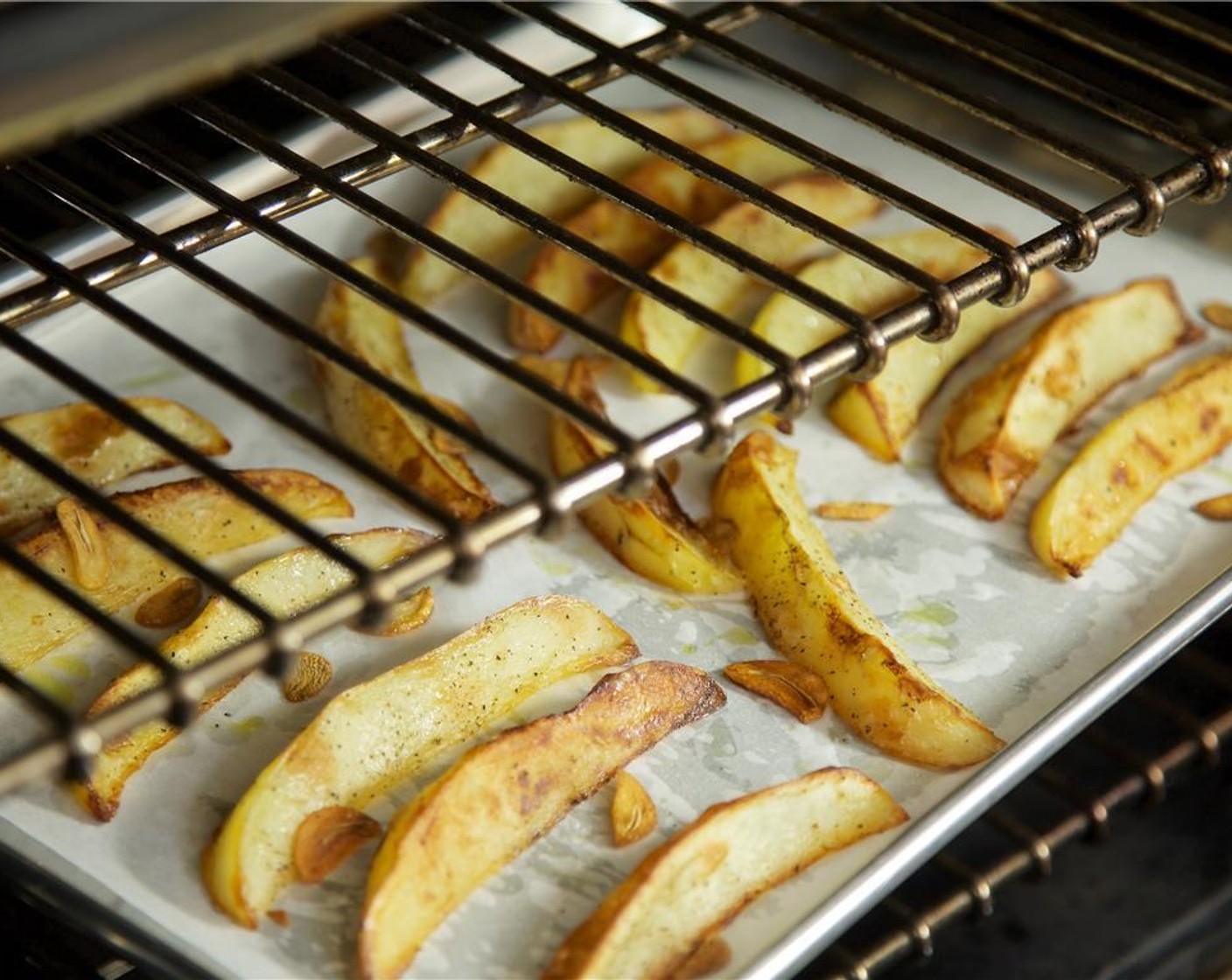 step 6 Place the potatoes in a single layer on a baking sheet lined with parchment paper. Bake for 30 minutes.