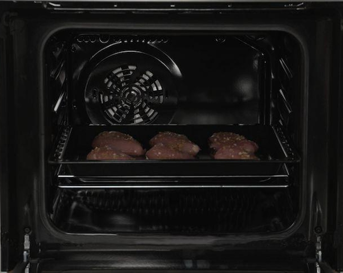 step 6 Unlike grilling on a pan, the Electrolux oven emits less heat. This means less smoke, making it easier to control inner temperature, resulting in the healthiest, juiciest chicken.