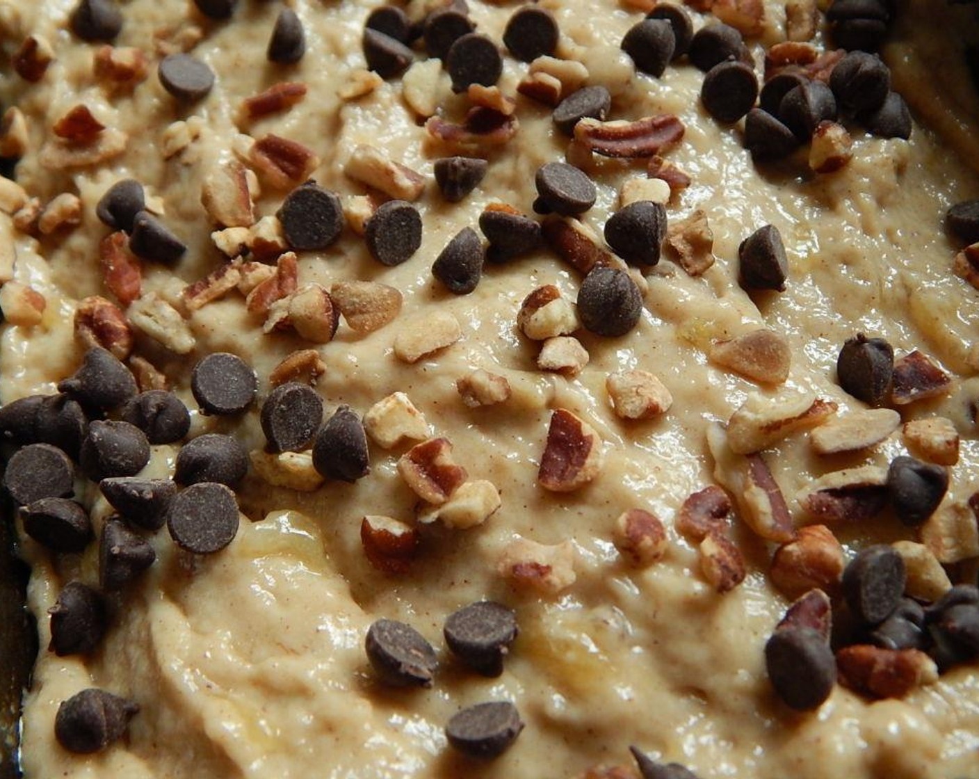 step 5 Top with remaining Pecans (1 Tbsp) and Mini Chocolate Chips (1 Tbsp). Bake in the oven for approximately 35 minutes.