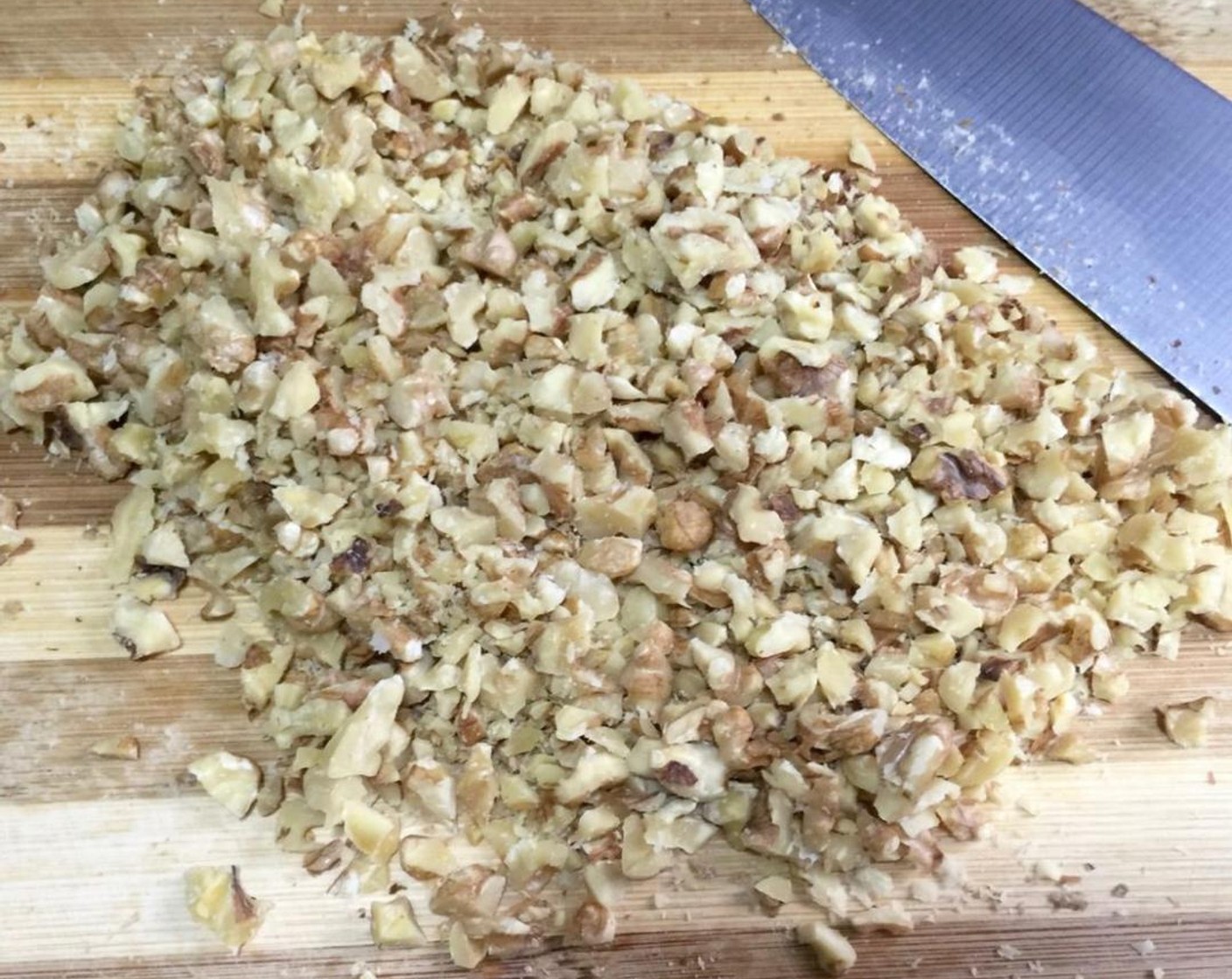 step 4 First, toast Walnut (1/4 cup) in a 180 degrees C (350 degrees F) preheated oven for 10 minutes and set aside to cool. Then, chop into bite size pieces.