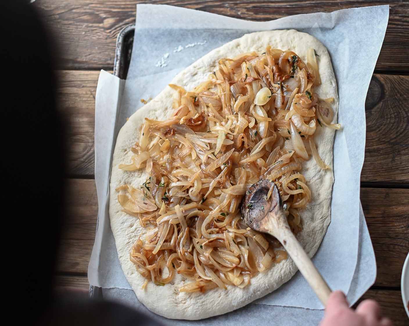 step 7 Spoon the shallots over the top of the dough, spreading them out to cover the surface of the focaccia.