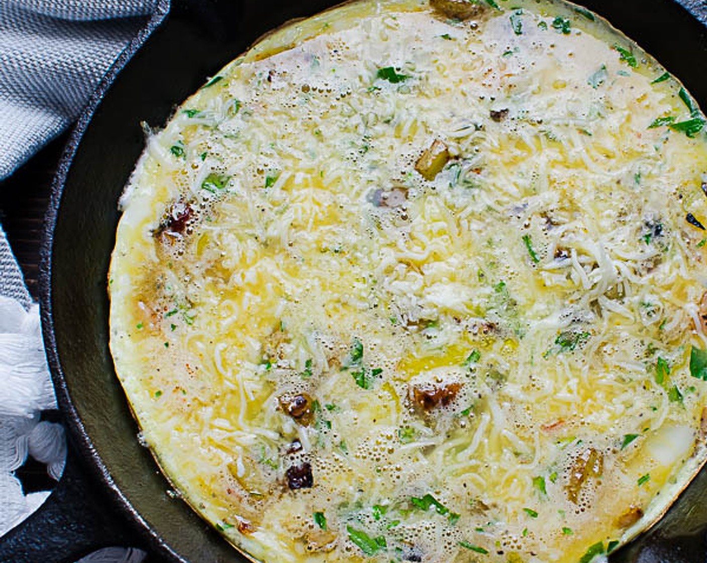 step 7 Transfer the skillet to the oven and bake for 3-5 minutes or until the top of the frittata is set.