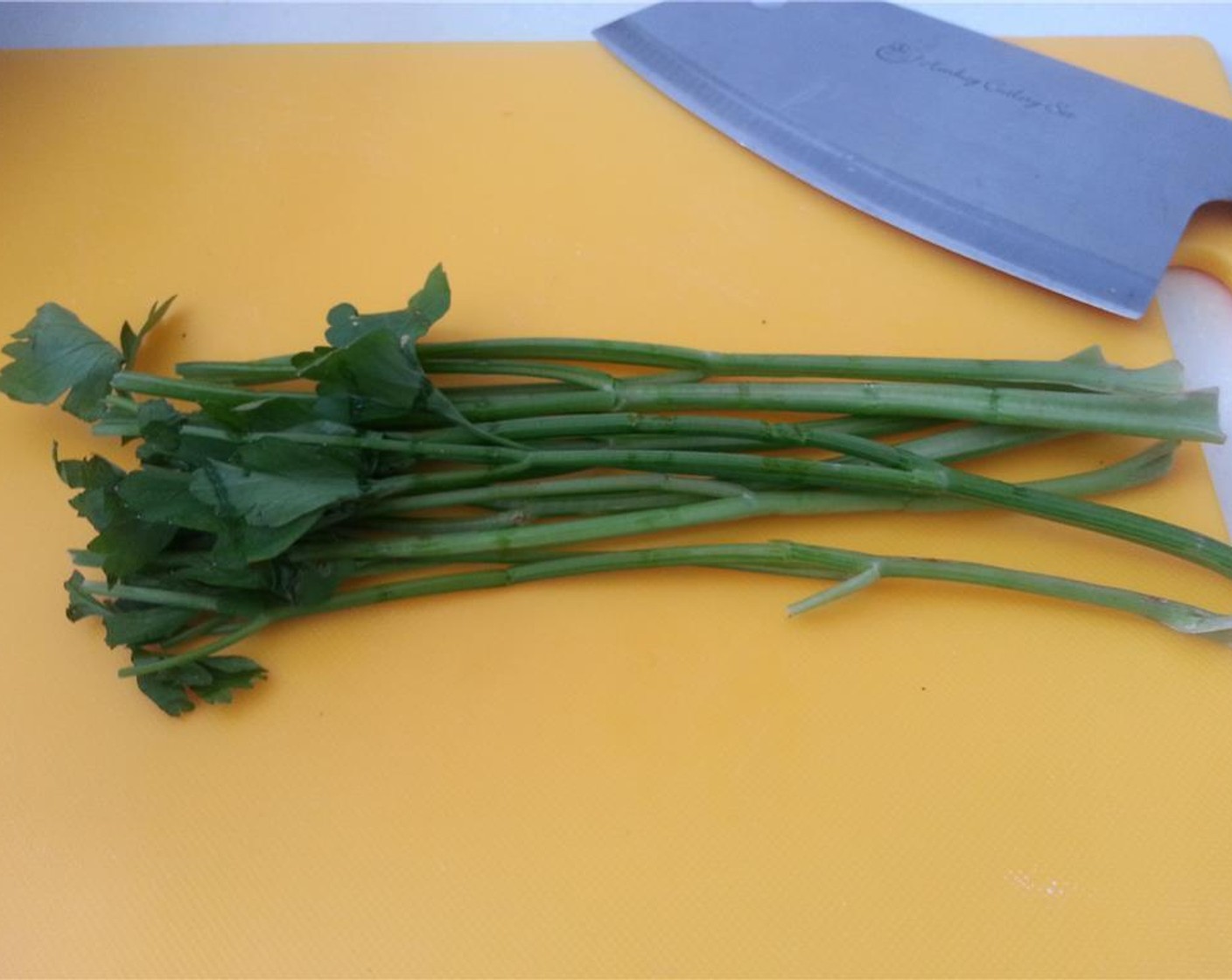 step 1 Cut the Fresh Parsley (1 bunch) to separate the leaves from the steams. Using the back of your knife, strike the Parsley Stems (1 bunch) a couple times.