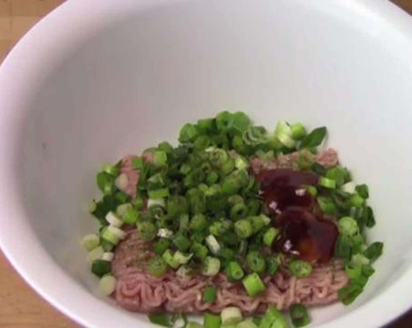 step 1 Inside a mixing bowl, mix together the Chicken Breasts (1.1 lb), Scallion (1 bunch), Fresh Parsley (2 tsp), Sweet Chili Sauce (2 Tbsp), Salt (to taste), and Ground Black Pepper (to taste). Set aside for later use.