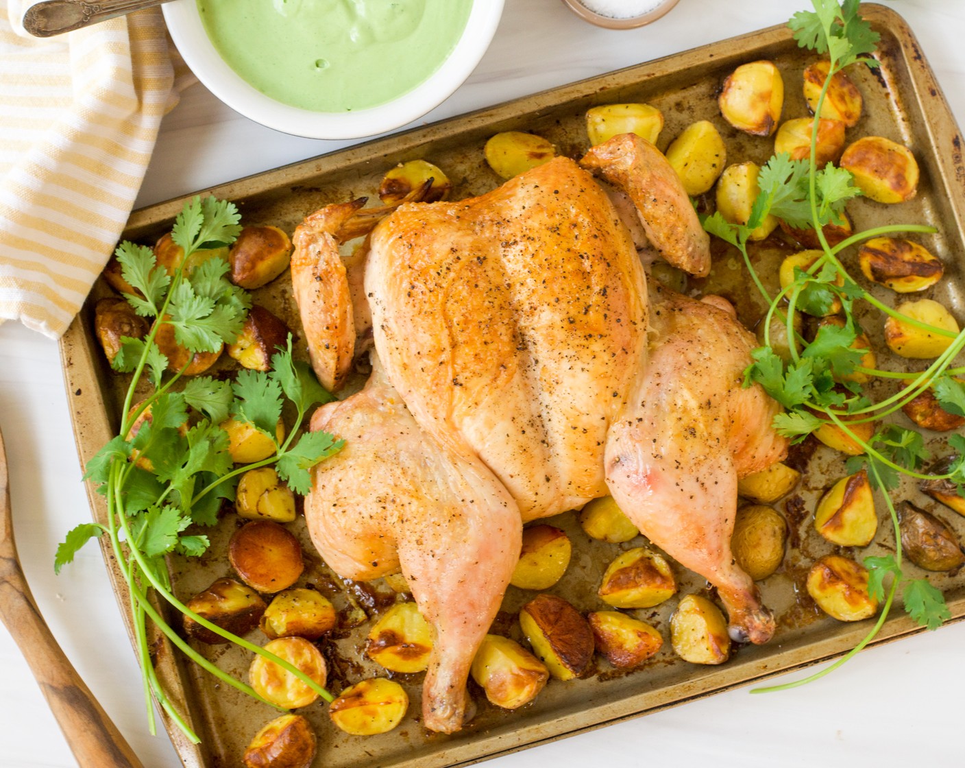 Spatchcocked Roast Chicken and Potatoes with Cilantro Yogurt Sauce