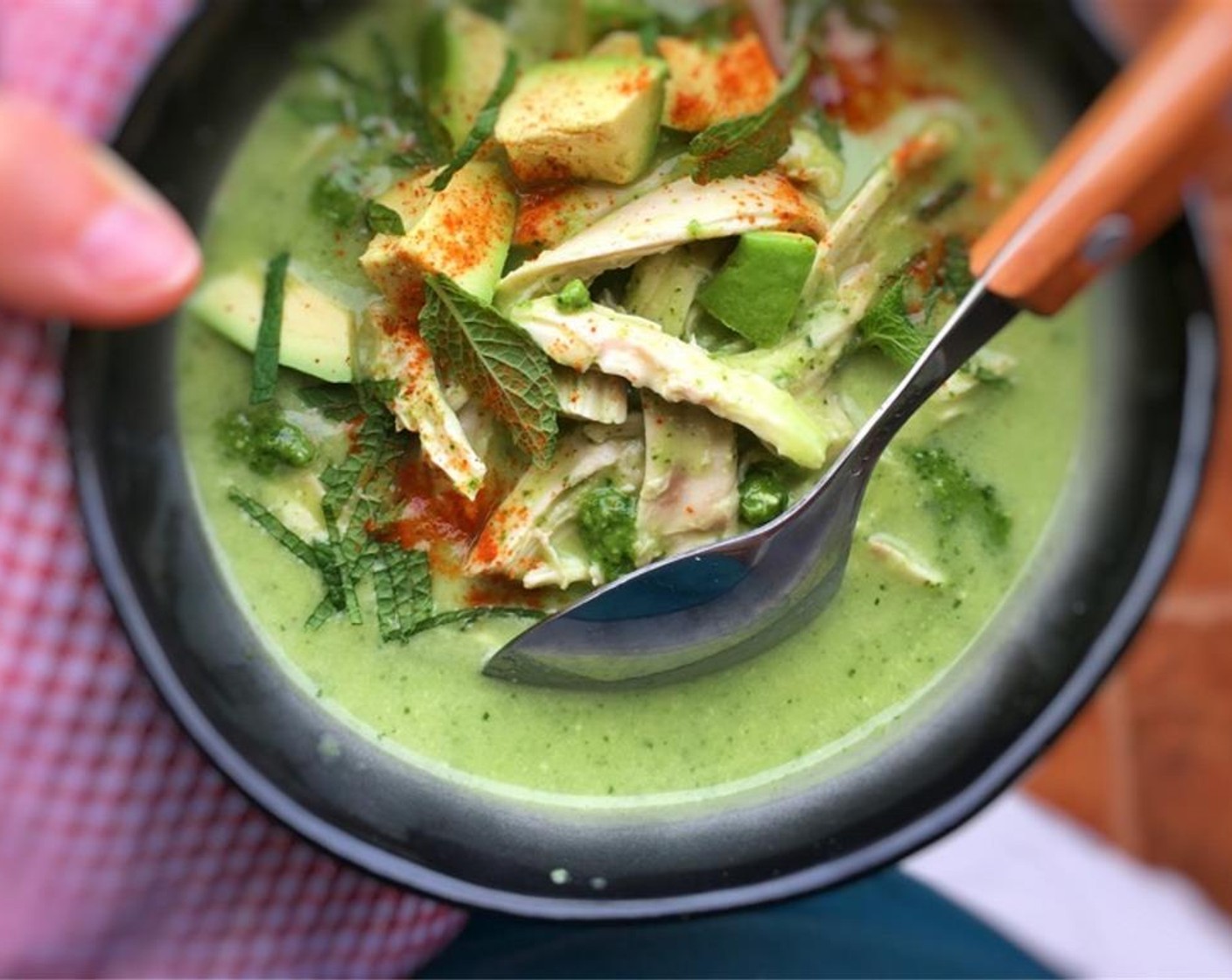 step 8 Take the pan off the heat and scoop the avocado chicken soup into large bowls. Serve hot and enjoy!