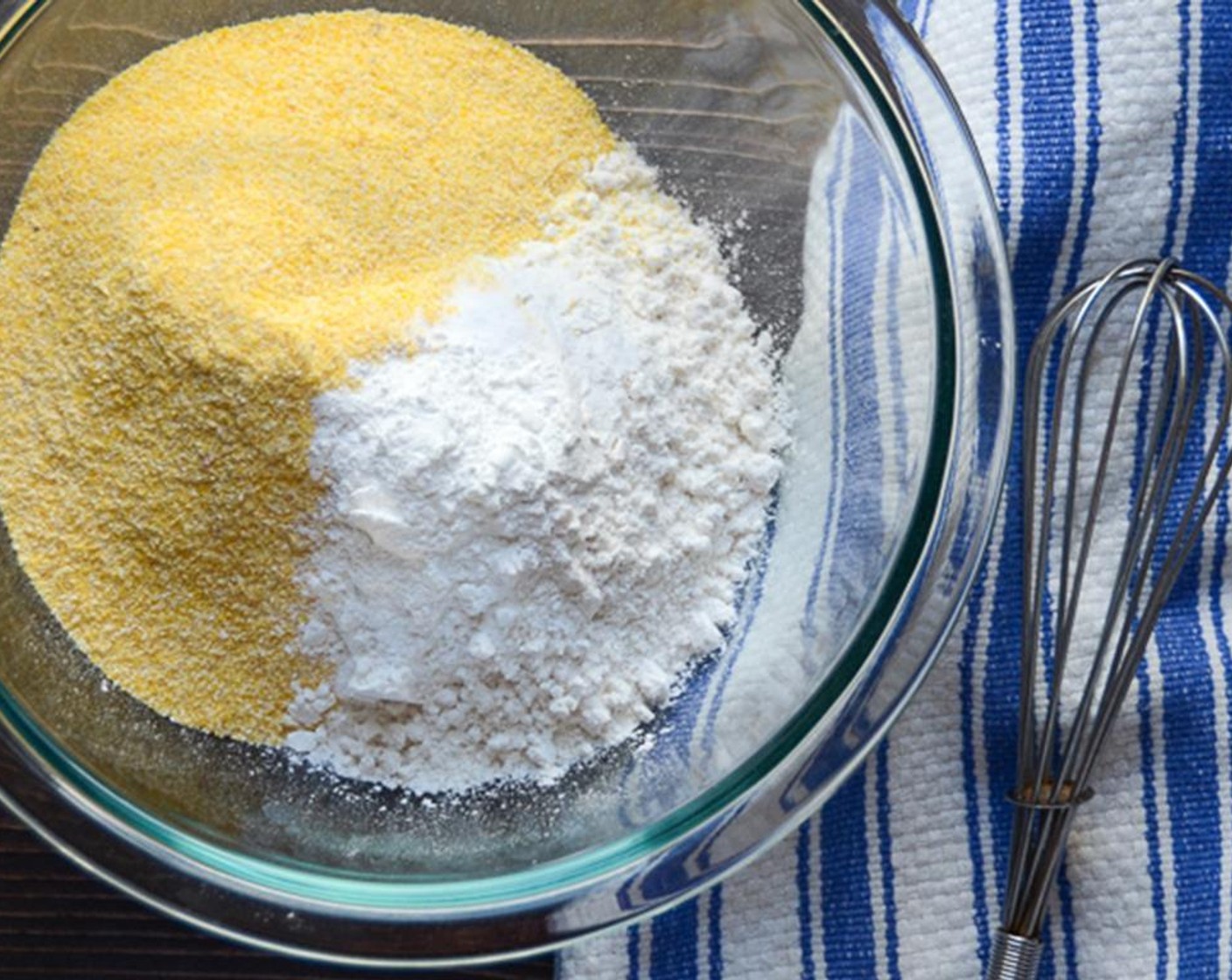 step 5 In a large bowl, whisk together the All-Purpose Flour (1 1/2 cups), Cornmeal (1 cup), Baking Powder (1/2 Tbsp), Baking Soda (1/4 tsp) and Salt (3/4 tsp). Set aside.