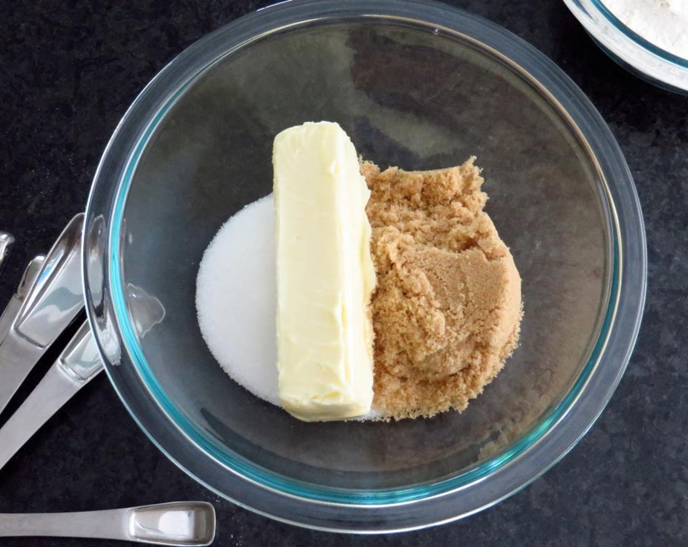 step 3 In a large bowl, combine softened Unsalted Butter (1/2 cup), Brown Sugar (1/2 cup) and Granulated Sugar (1/2 cup) With a hand mixer on medium speed, cream together until light and fluffy.