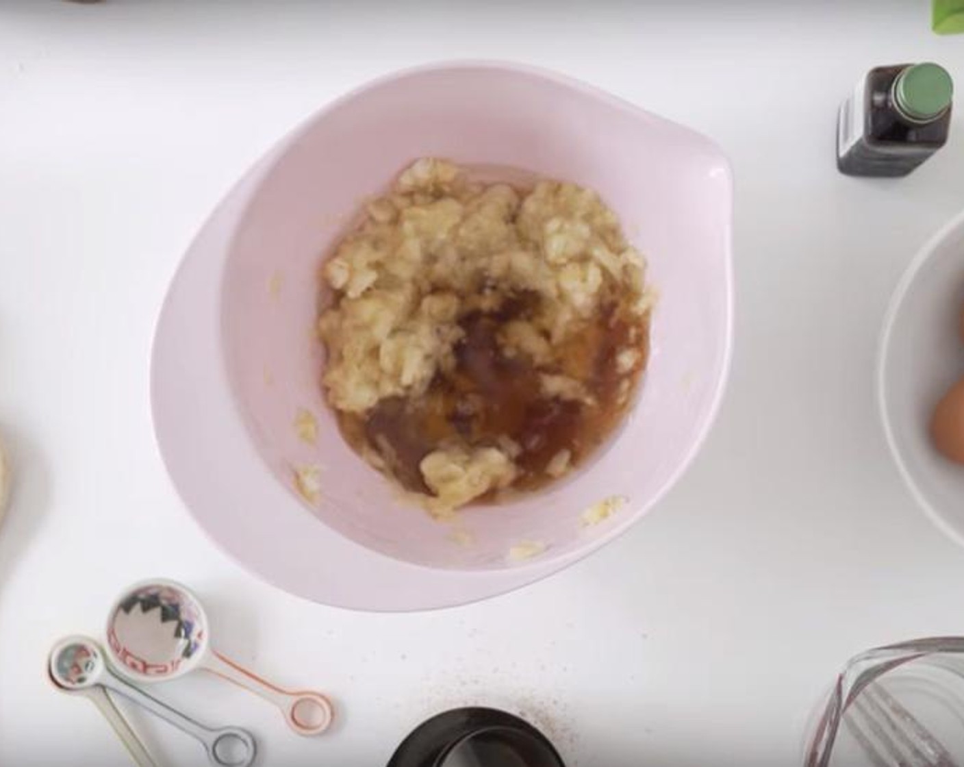 step 3 In a separate bowl, whisk together Banana (2/3 cup), Maple Syrup (1/4 cup), Coconut Oil (1/2 cup), Eggs (4), and Vanilla Extract (1/2 Tbsp). Then add the wet to the dry ingredients.