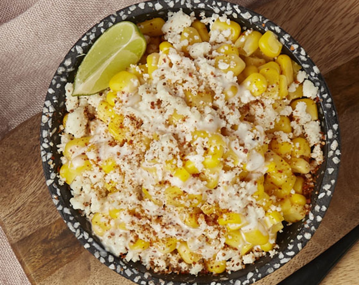 step 4 Re-add La Vaquita® Crema Mexicana, La Vaquita® unsalted butter, chile piquín, lemon and sprinkle La Vaquita® Queso Fresco (to taste)!