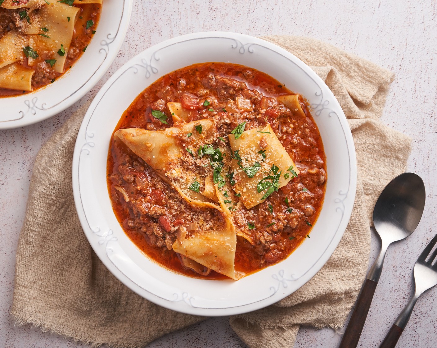 step 6 Top with the Grated Parmesan Cheese (1 cup), Shredded Mozzarella Cheese (1 cup), and Fresh Parsley (to taste) right before serving in the serving bowl. Enjoy it warm!