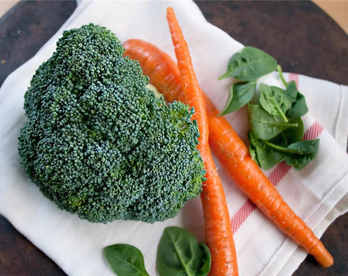 step 1 Steam the Broccoli (1 head) and Carrots (2) so they are just tender. Once done, set aside for use later.