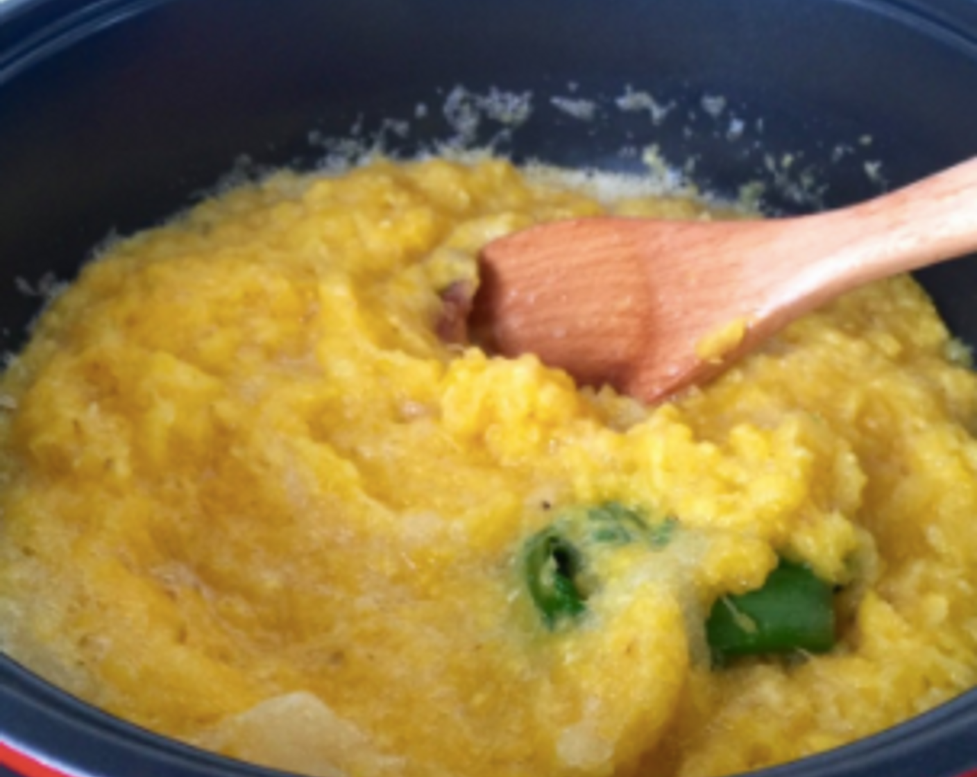 step 15 Stir the pineapple mixture with a wooden spoon to ensure everything is well mixed.