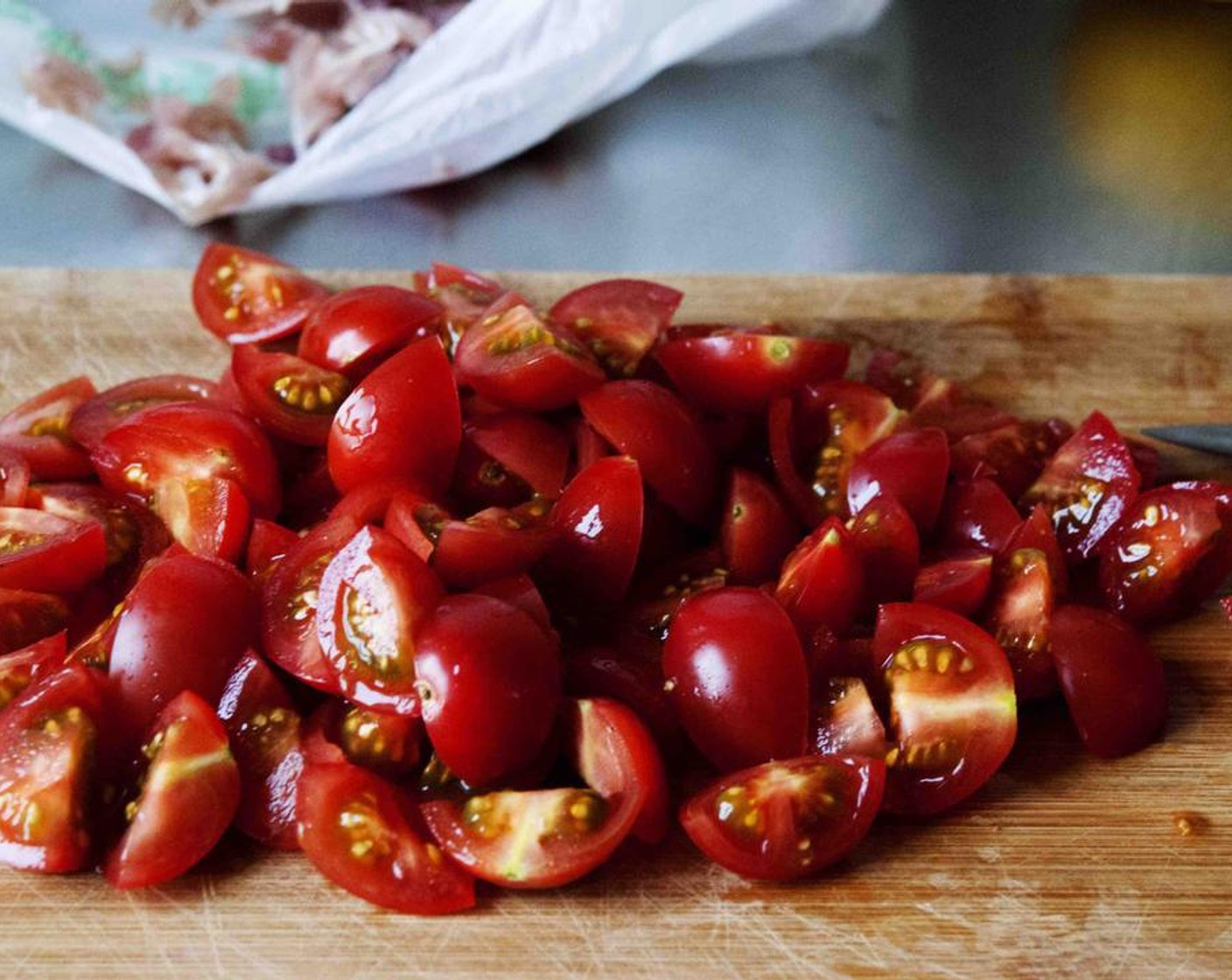 step 2 Cut the Cherry Tomatoes (1 2/3 cups) into quarters.