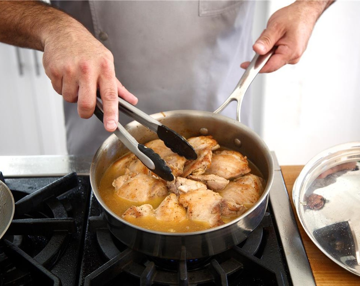 step 8 Add White Cooking Wine (1/2 cup) and chicken broth.  Scrape the bottom of the pan to release any browned bits. Cover and let cook for 15 minutes. Chicken is done when meat easily pulls
 apart with a fork.