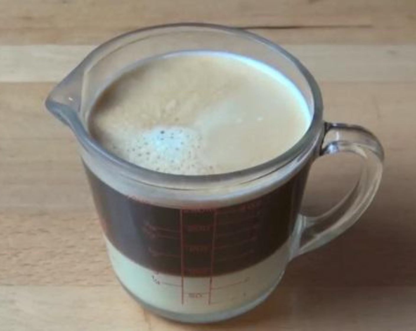 step 1 Into a cup, mix the Sweetened Condensed Milk (1/4 cup) and Coffee (3/4 cup) together.