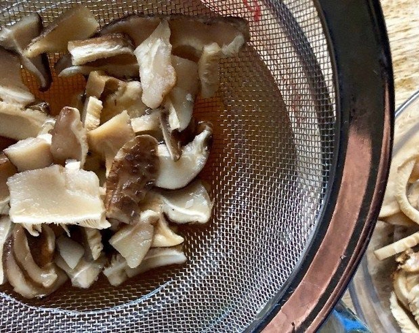 step 2 Strain the mushrooms over another bowl, setting the stock aside for later. Mince or thinly slice the mushrooms.