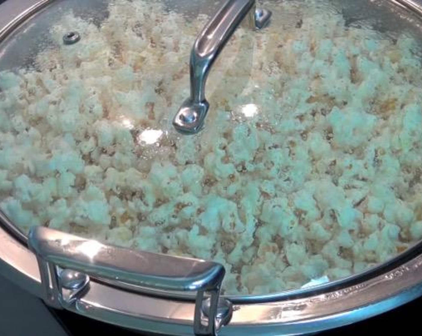 step 1 In a large saucepan, heat Vegetable Oil (1/4 cup) over medium heat. Place a few kernels of the Popcorn Kernels (1/2 cup) into the oil. When they begin to sizzle and pop, pour in the rest. Cover and cook until popping slows down. Transfer to large bowl.