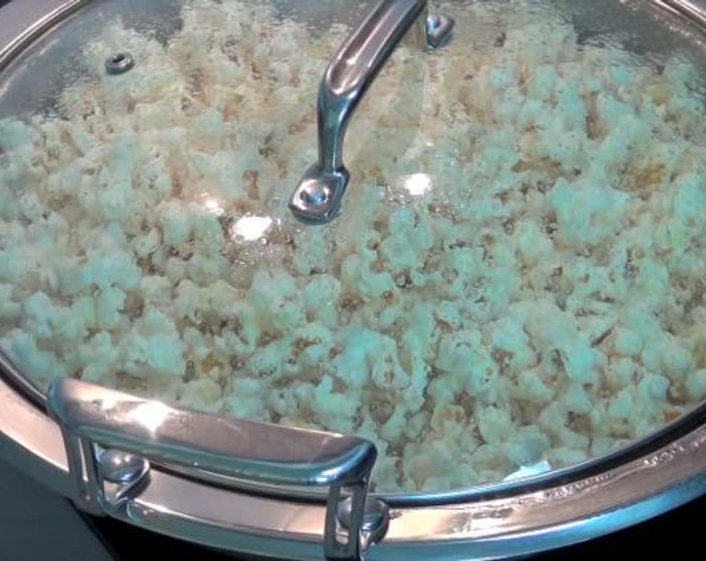 step 1 In a large saucepan, heat Vegetable Oil (4 Tbsp) over medium heat. Place a few kernels of the Popcorn Kernels (1/2 cup) into the oil. When they begin to sizzle and pop, pour in the rest. Cover and cook until popping slows down. Transfer to large bowl.
