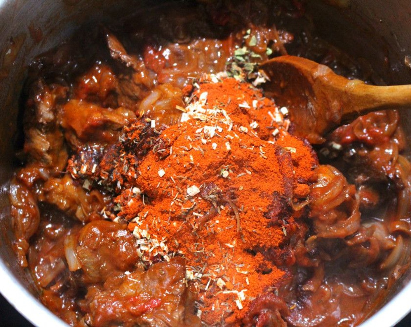 step 6 Add Hungarian Paprika (1/2 cup), Dried Red Chili Peppers (4), Ground Sichuan Pepper (2 Tbsp), Oyster Sauce (2 Tbsp), Lemongrass (2 Tbsp), Dried Oregano (1 tsp), Dried Thyme (1 tsp), Cayenne Pepper (to taste) and Kosher Salt (to taste) to the meat.