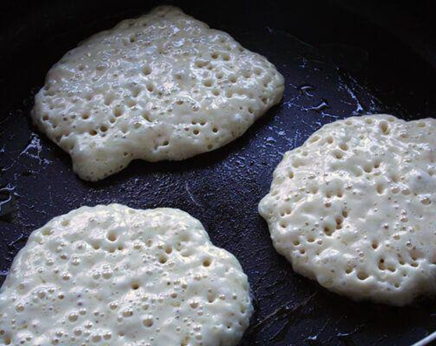 step 5 Cook approximately 2 minutes until top is bubbly and edges are golden brown. Flip and cook another 1-2 minutes. Repeat until batter is gone.