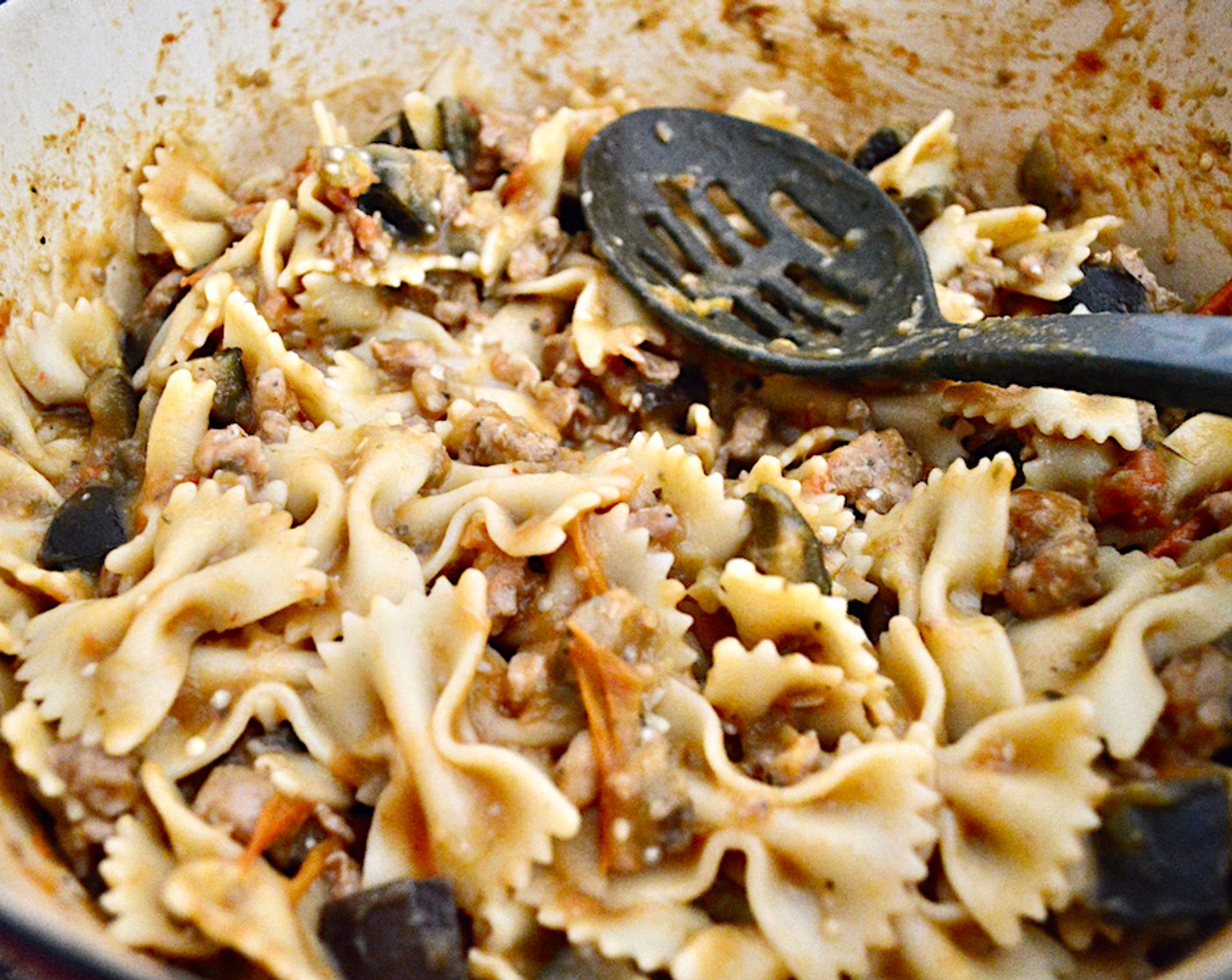 step 6 Finally, drain the pasta and stir into the sauce.