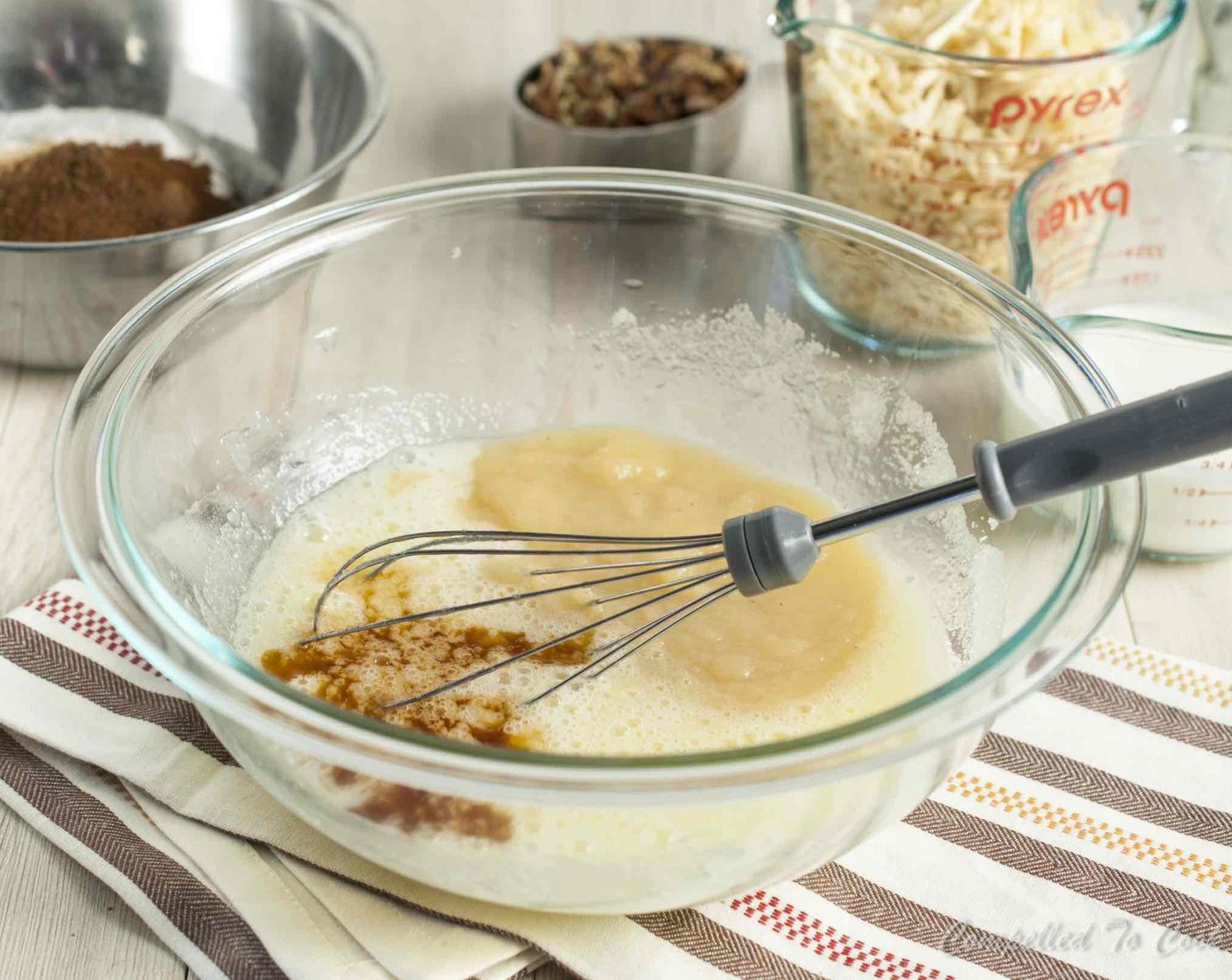step 4 Whisk in Unsweetened Apple Sauce (1/2 cup), Milk (1/2 cup), and Vanilla Extract (1 tsp).