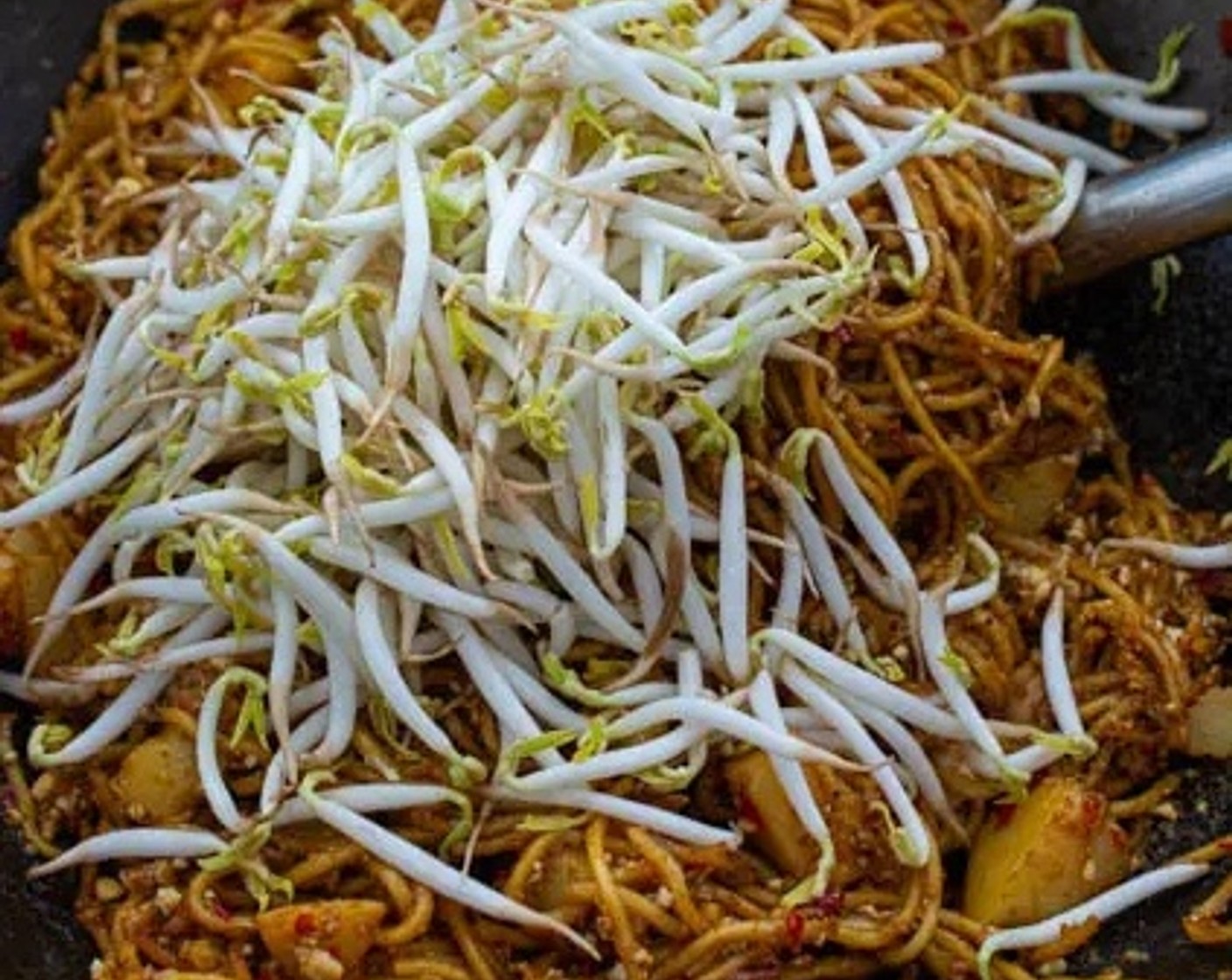 step 12 Add Bean Sprouts (1 1/2 cups) to the noodles. Stir to combine all the ingredients.