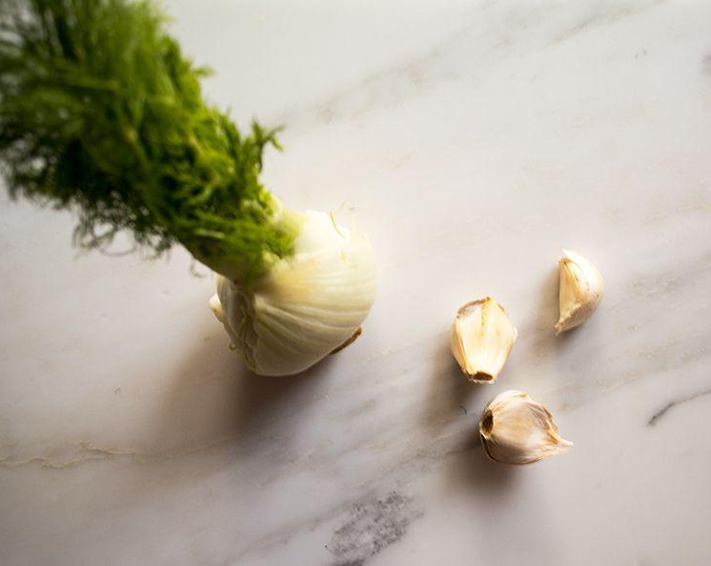 step 6 Peel skin from Garlic (3 cloves) add to the baking pan and continue baking for an additional 25 minutes or until the squash is tender.