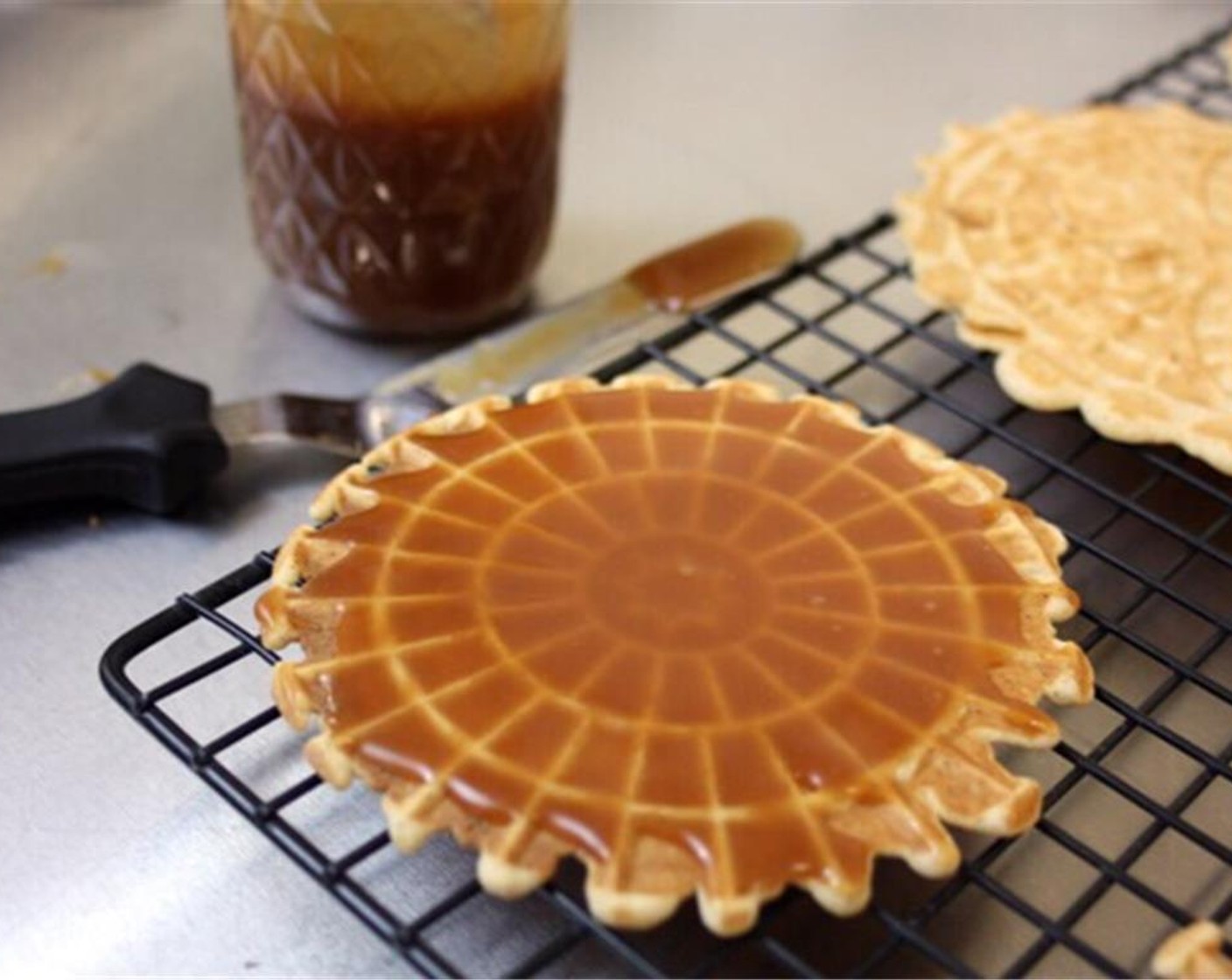 step 9 Use a spatula to move the finished cookies onto a flat cooling rack.