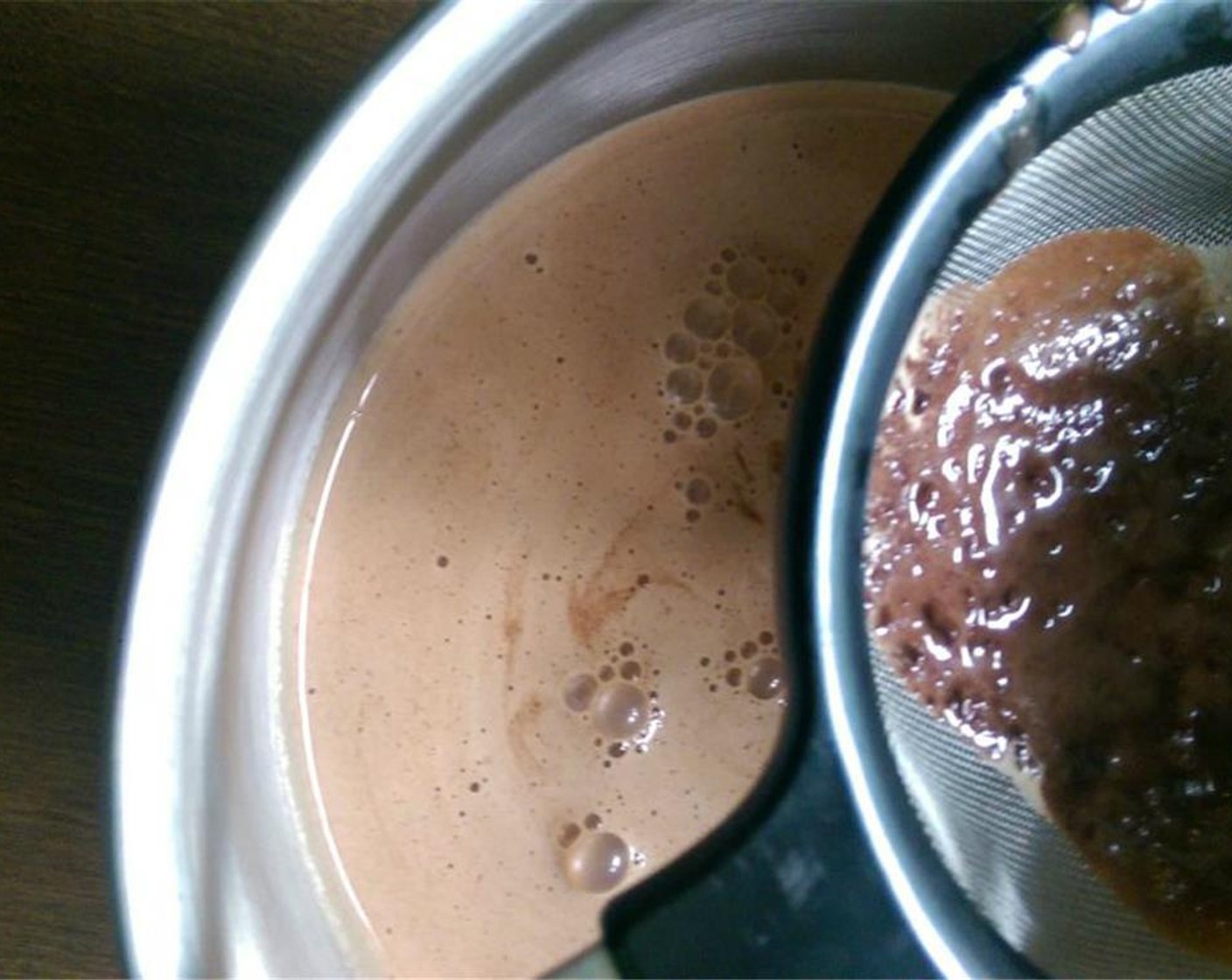 step 8 Pour the thickened mixture through a strainer into a heat proof bowl.