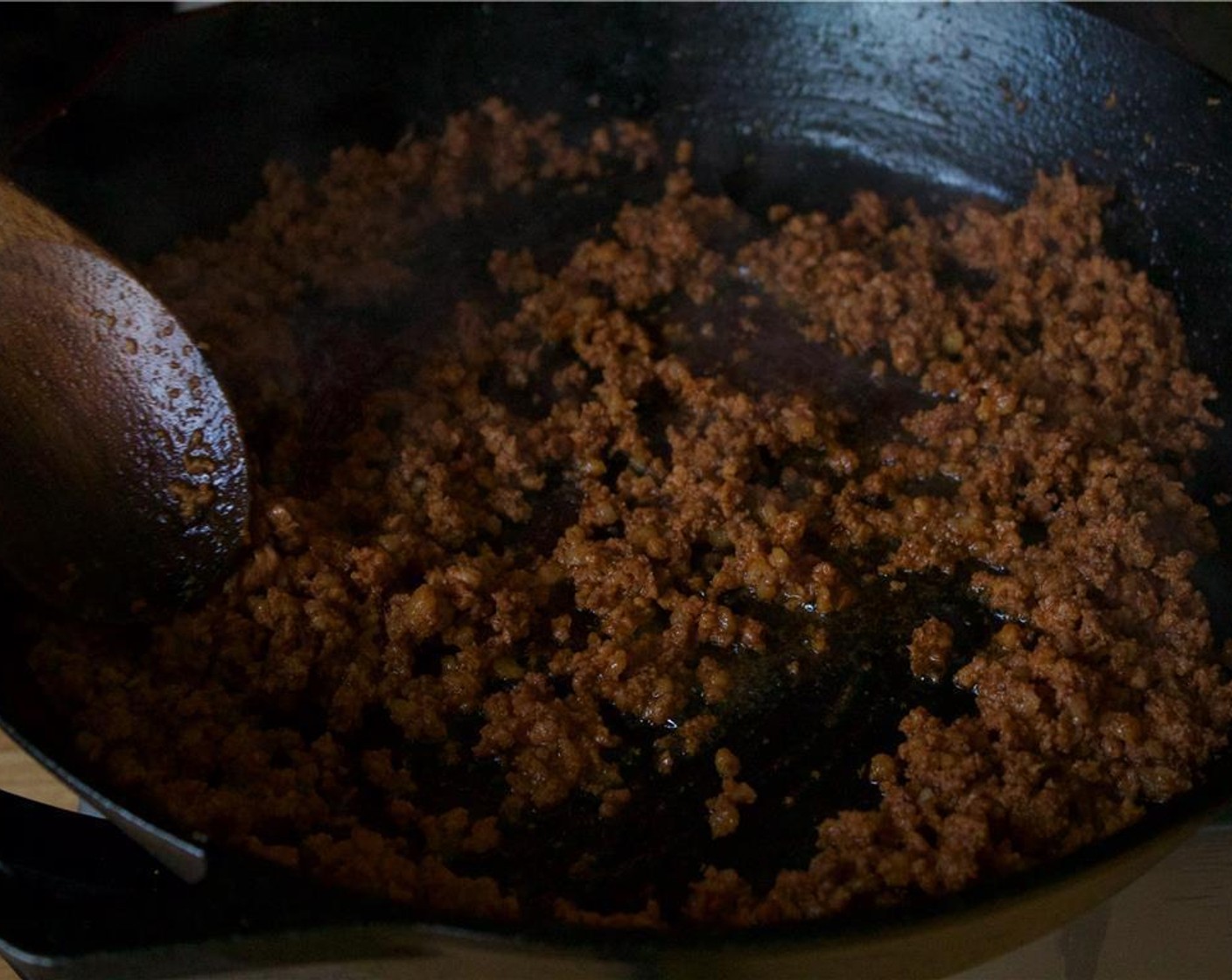 step 4 Over medium-high heat, brown off the Spanish Chorizo (1). Render off the fat and crisp up the sausage in a cast iron pan, about 8 to 10 minutes.