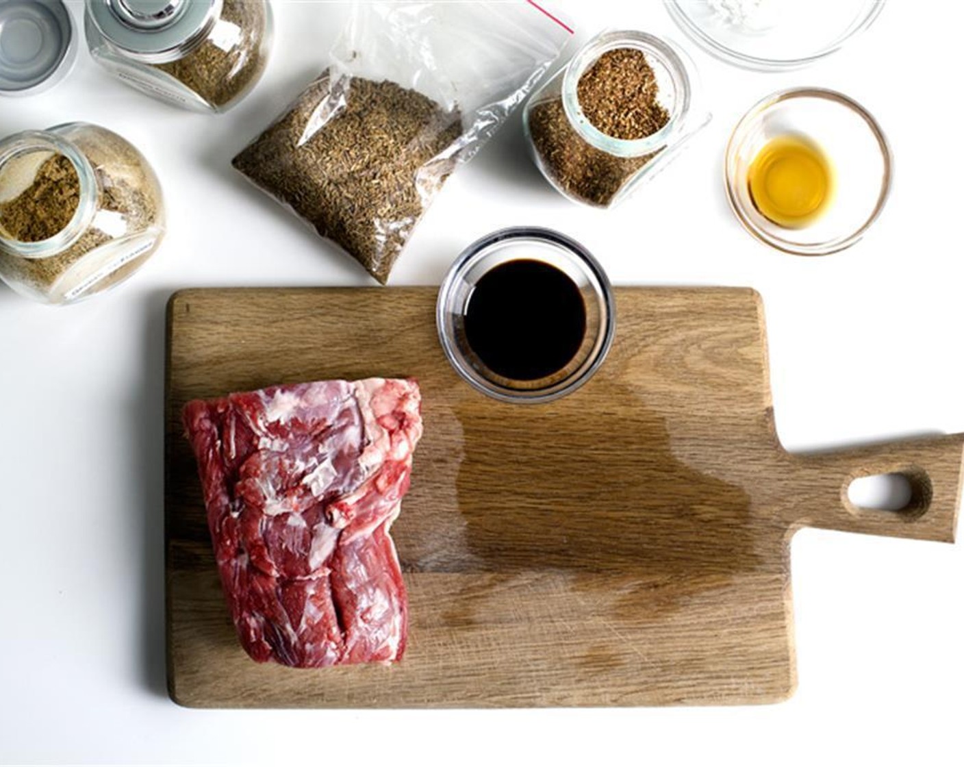 step 3 To make the marinade, combine Soy Sauce (1 tsp), Ground Cumin (1 tsp), Corn Starch (1 tsp), Dark Soy Sauce (1/2 tsp), Ground Coriander (1/2 tsp), Crushed Red Pepper Flakes (1/2 tsp), Toasted Sesame Oil (1/2 tsp), Simply Organic Garlic Powder (1/4 tsp), Ground White Pepper (1/4 tsp) and Sichuan Peppercorns (1/8 tsp).