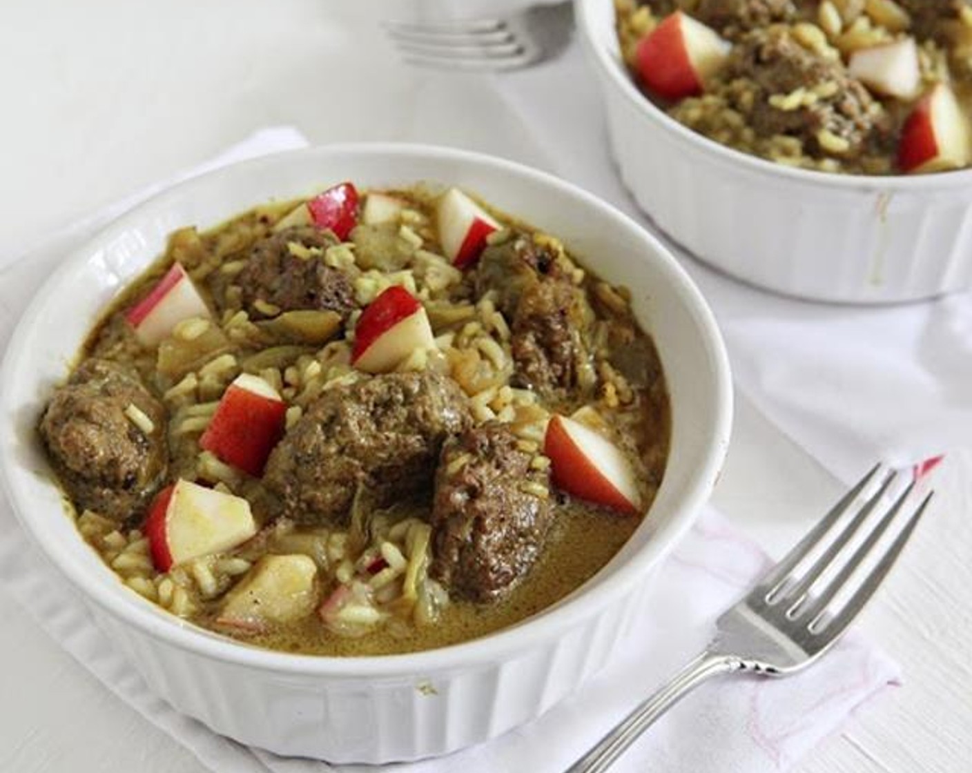 Curried Guinea Meatballs with Escarole and Rice