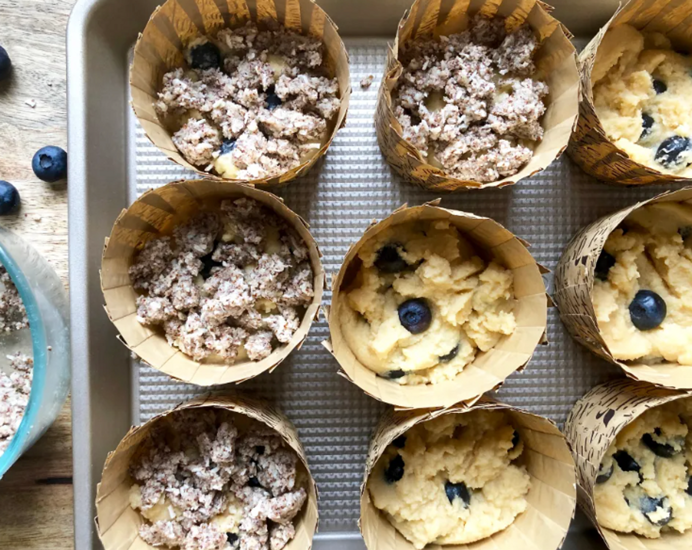 step 8 Sprinkle the crumb topping evenly over the batter in each cup.