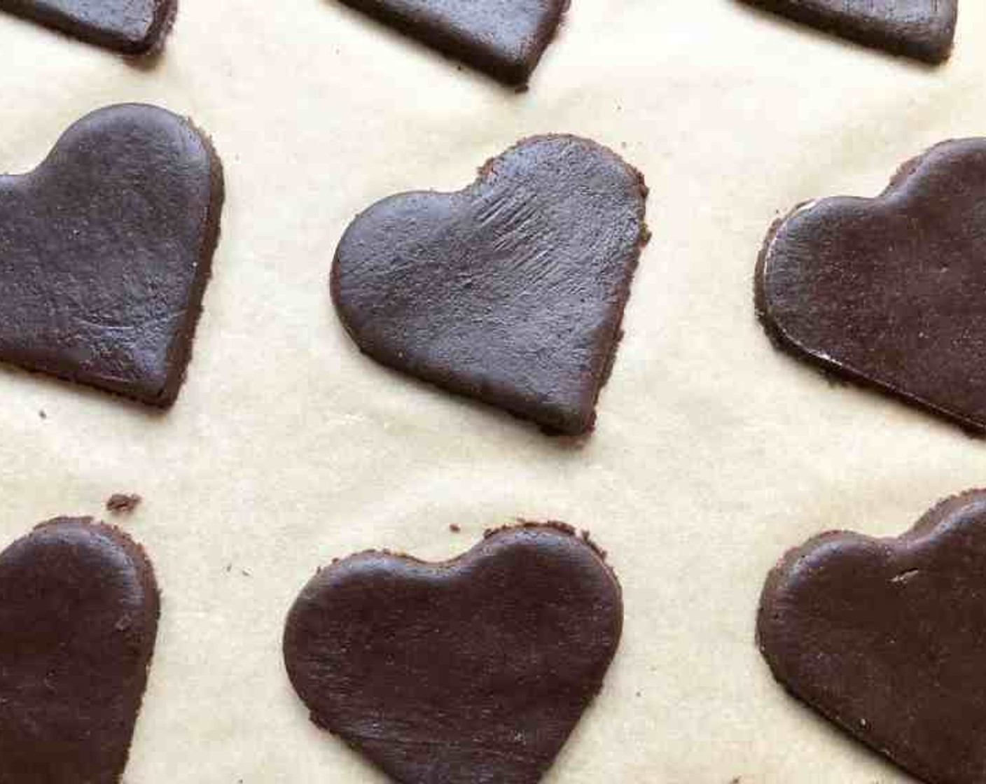 step 8 Place the cutouts on the prepared baking sheets with a small space between each. Bake in the oven for 8 minutes.