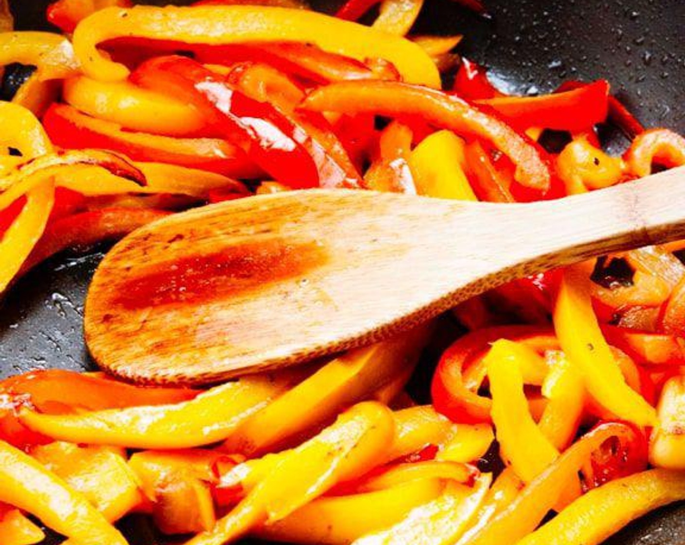 step 2 In a skillet heat Olive Oil (2 Tbsp) and Garlic (1 clove) and add the bell peppers.