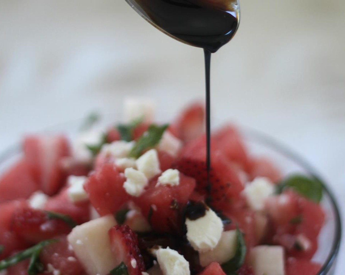 step 5 When ready to serve, crumble the Goat Cheese (1/2 cup) over top of the salad and stir it in. Drizzle the balsamic reduction on top just before eating.