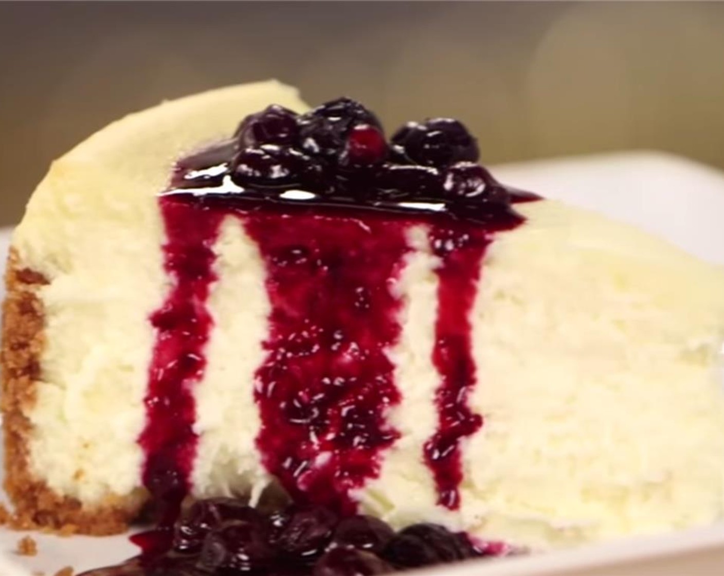 step 12 Serve cheesecake plain, with whipped cream, fresh fruit, or warm blueberry compote.