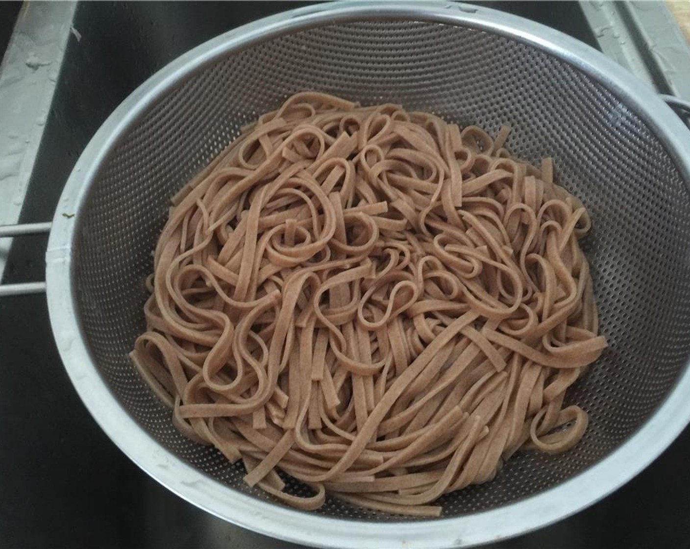 step 7 Drain the pasta and toss with Olive Oil (1 Tbsp) in a medium bowl. Set aside.