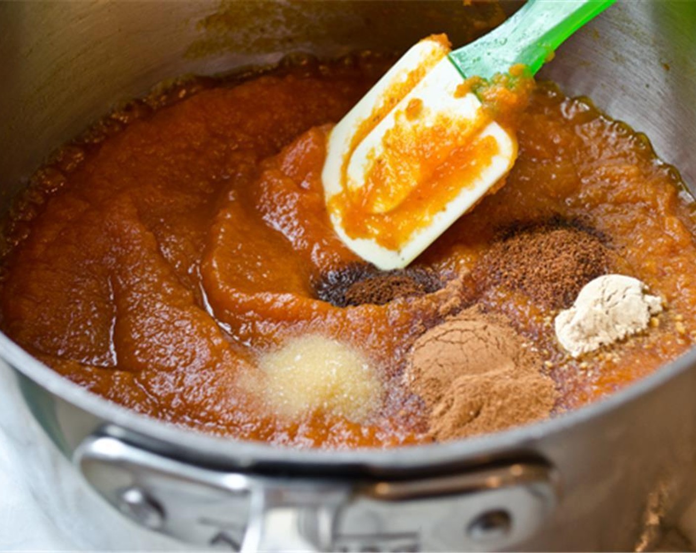 step 5 For the filling, bring about 4 quarts of water to a simmer in a tea kettle. In a small saucepan, stir together the Canned Pumpkin Purée (1 can), Granulated Sugar (1 1/3 cups), Ground Cinnamon (1 tsp), Ground Ginger (1/2 tsp), Ground Nutmeg (1/4 tsp), Ground Cloves (1/4 tsp), and Salt (1/2 tsp).