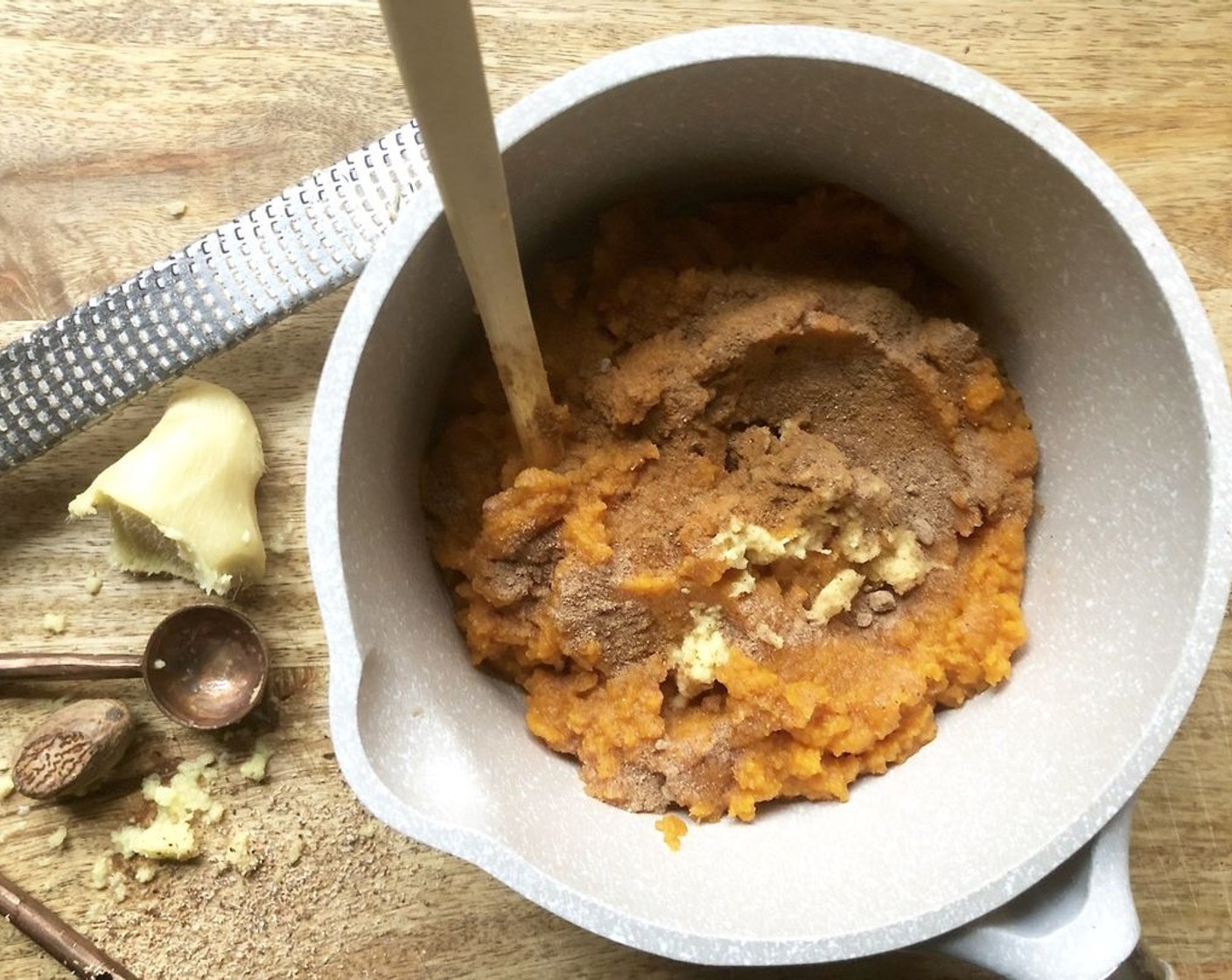 step 1 In a medium saucepan, combine the Unsweetened Pumpkin Purée (1 can), Fresh Ginger (1 tsp), Ground Cinnamon (1/4 tsp), Ground Nutmeg (1/4 tsp), and a pinch of Kosher Salt (to taste). Cook over medium heat, stirring frequently until steaming heavily, darker in color and slightly thicker, about 5 minutes.