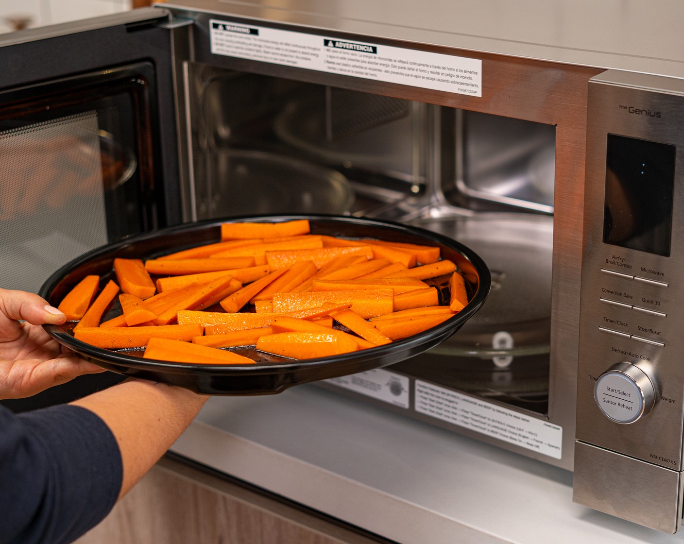 step 3 Place on a microwave-safe enamel tray and cook in the Panasonic 4-in-1 Multi Oven on Airfry Mode for 15-20 minutes, until carrots are tender-soft.