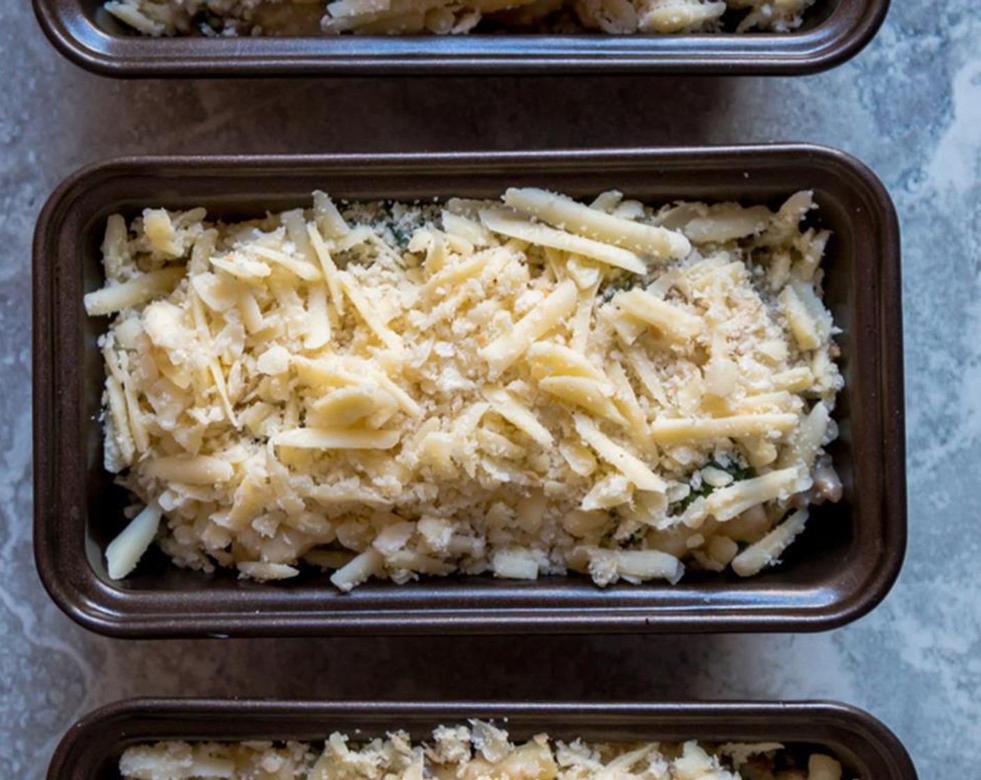 step 6 In a small bowl, mix together the Breadcrumbs (3 Tbsp) and remaining Mature Cheddar Cheese (1/3 cup). Sprinkle over the kefta and kale mac and cheese.