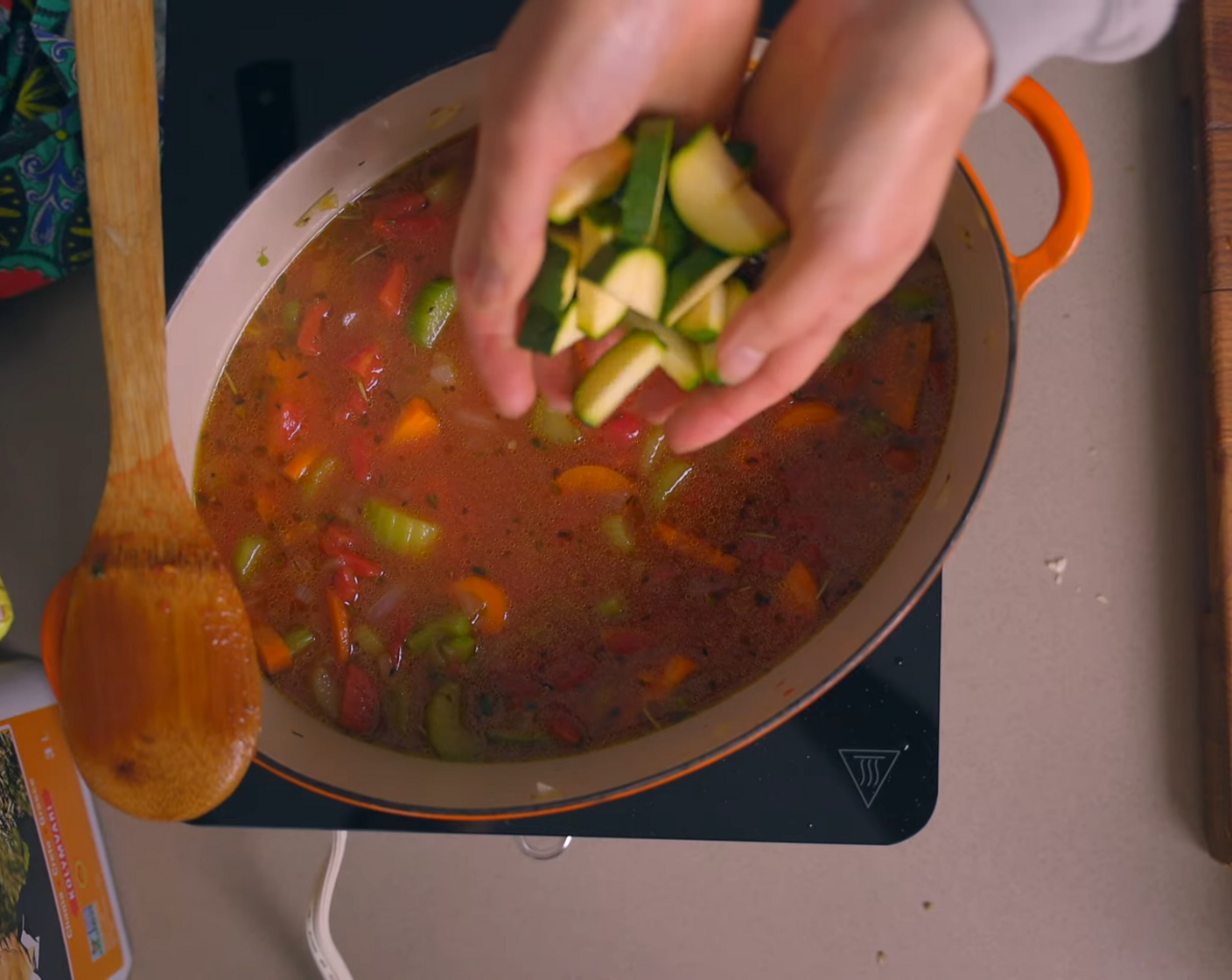 step 5 Now add Diced Tomatoes (1 can) and Zucchini (1).