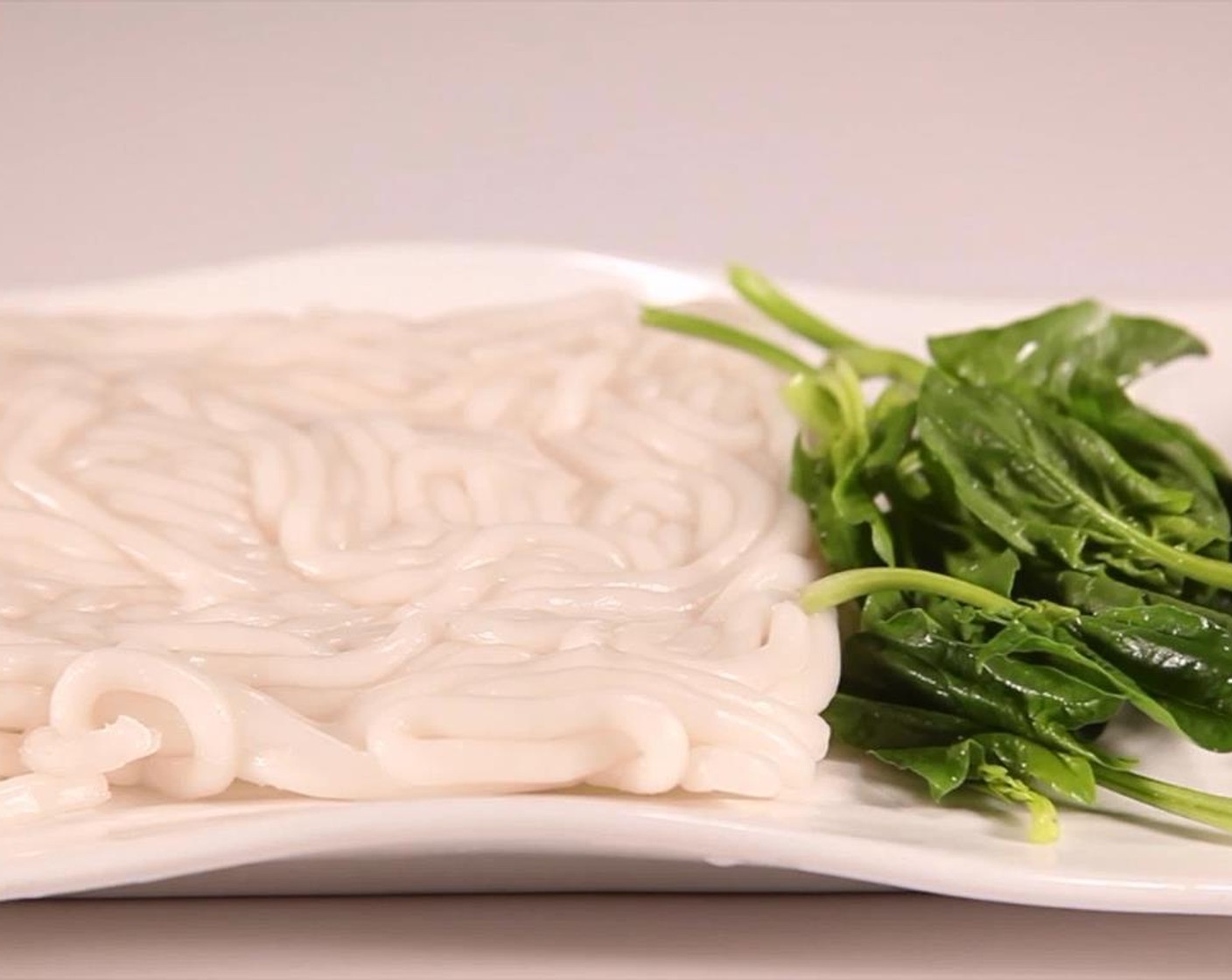 step 1 Boil the Fresh Potato Noodles (6 oz) and Pea Shoots (1 handful) and set aside.